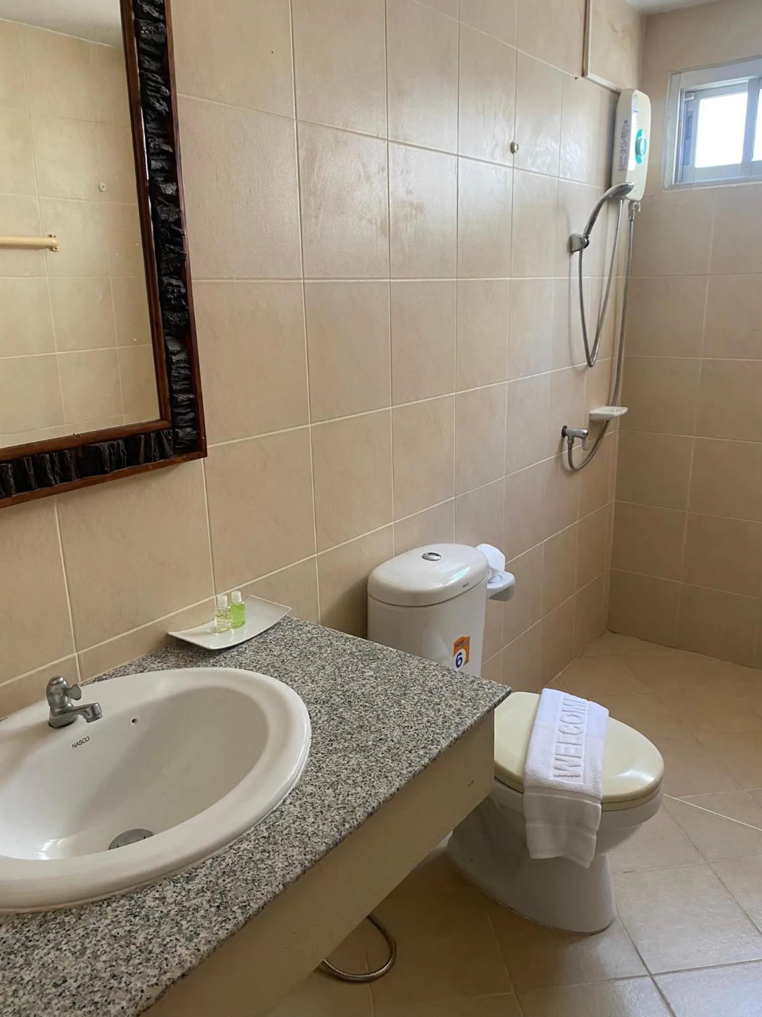 Shower in NAKA GUEST HOUSE