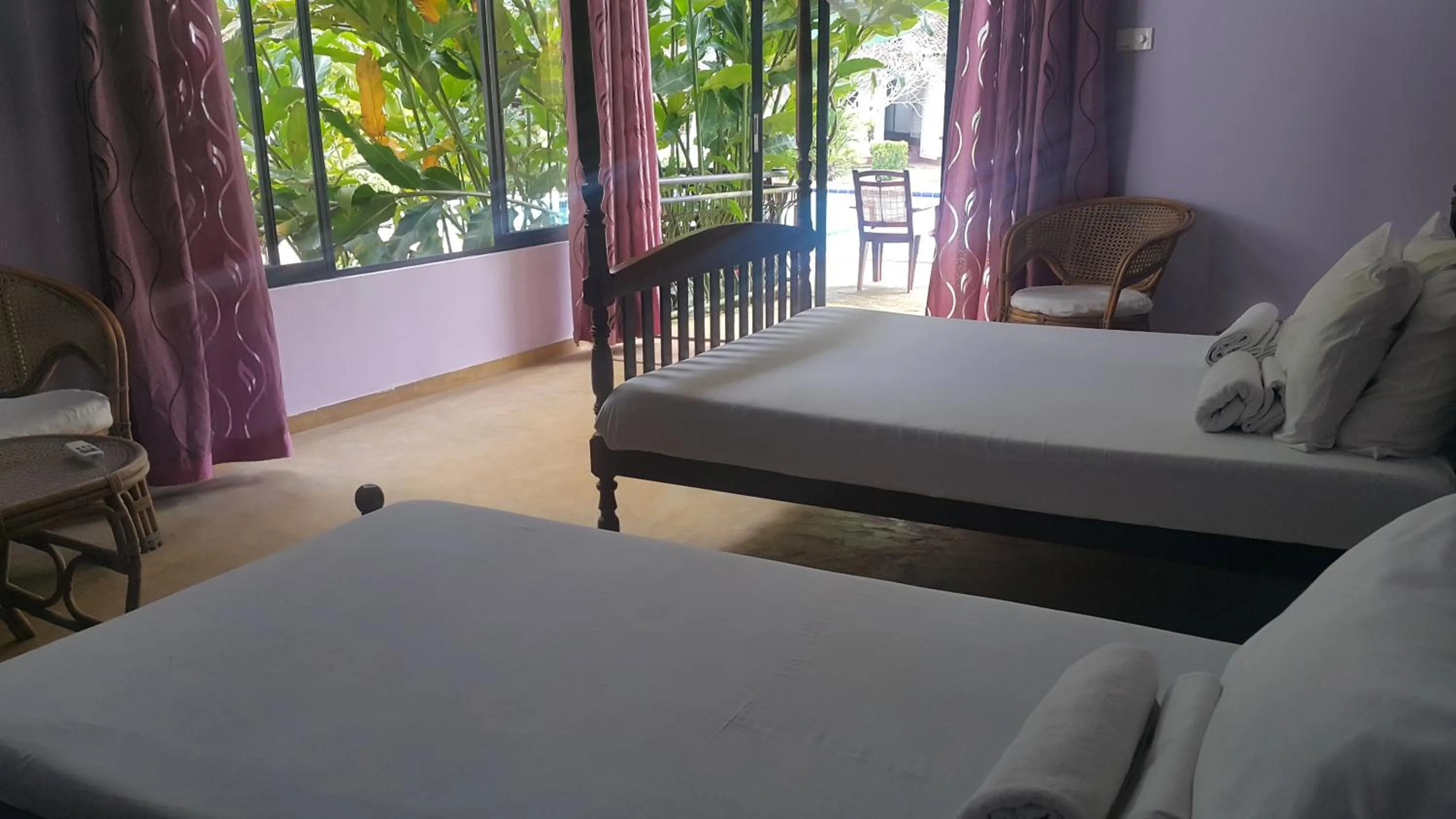 Triple Room with Pool View in Leijay Garden Retreat