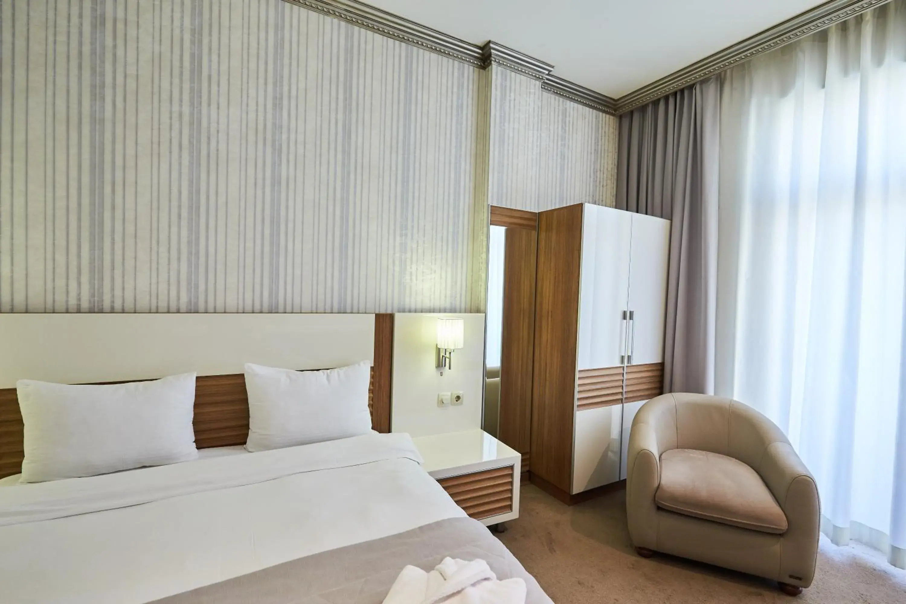 Bed in Boulevard Side Hotel Bed in Boulevard Side Hotel