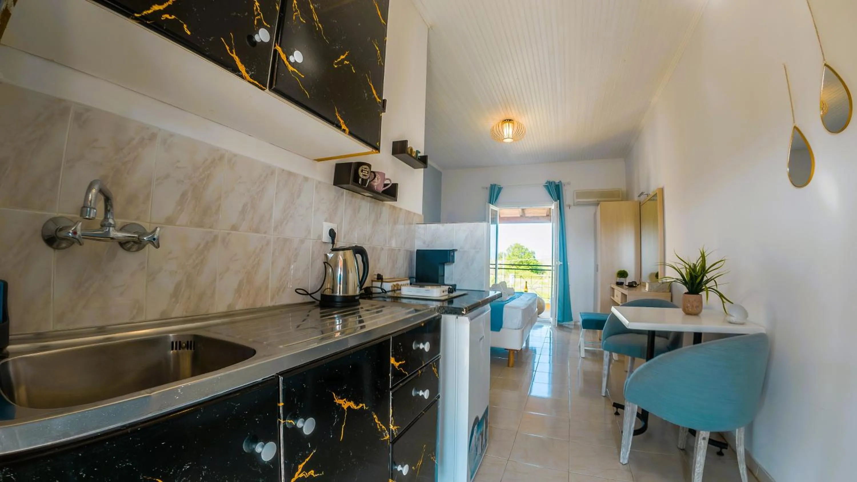 Kitchen or kitchenette in Melitsa corfu hotel