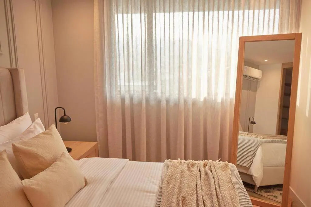 Bed in Go Living Suites: Your Medellin Retreat