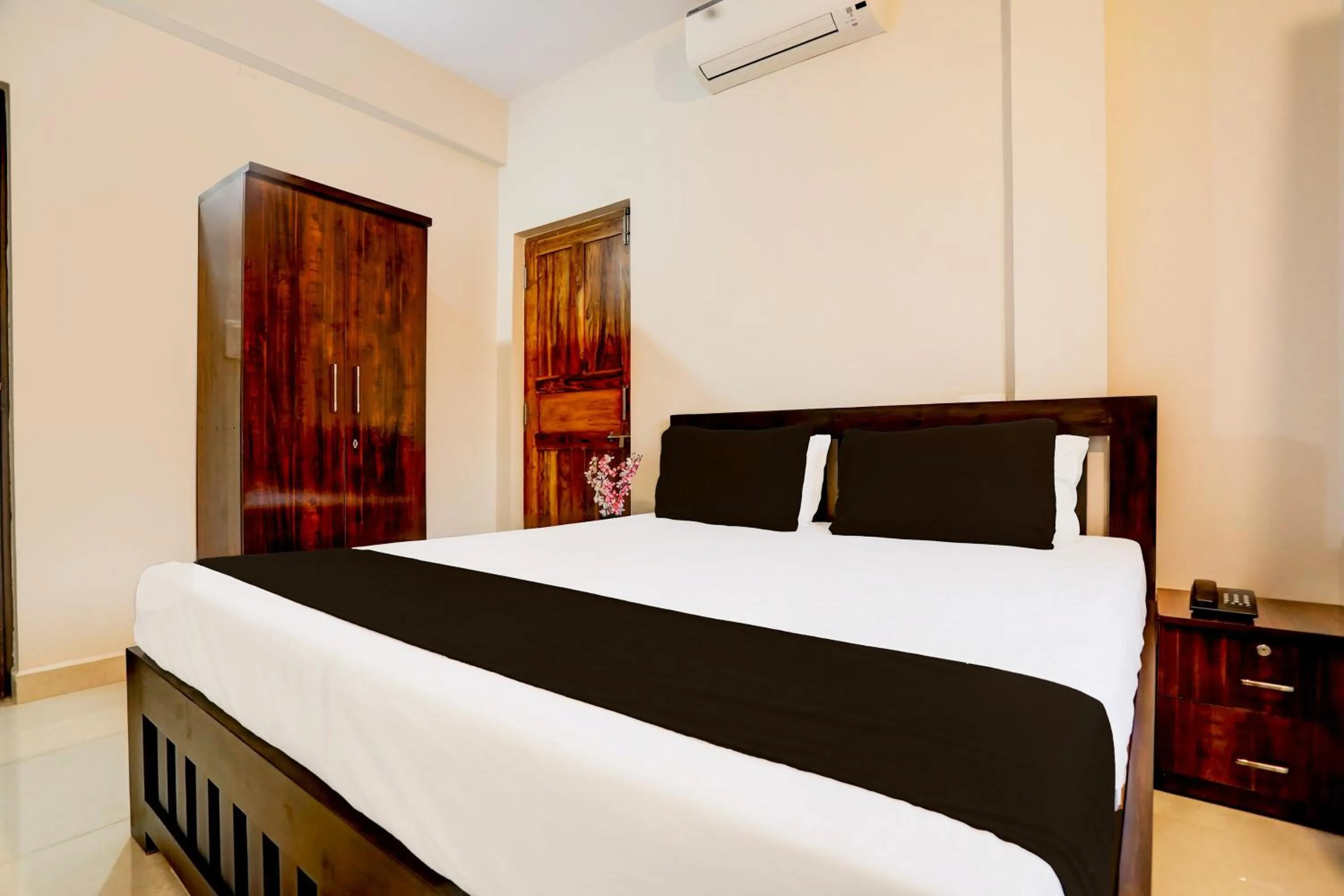 Bedroom in Hotel O Aqua Service Apartments