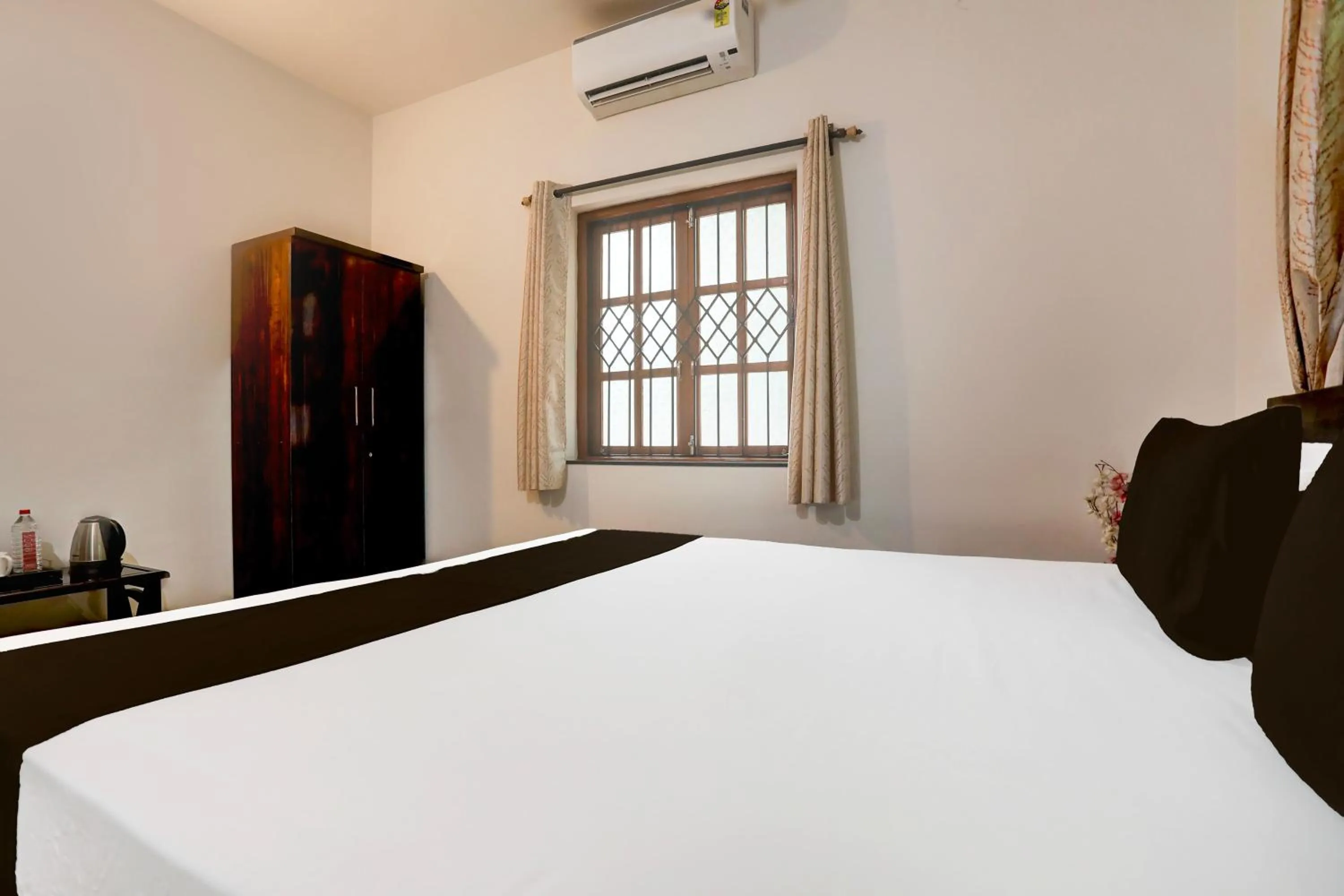 Bedroom in Hotel O Aqua Service Apartments