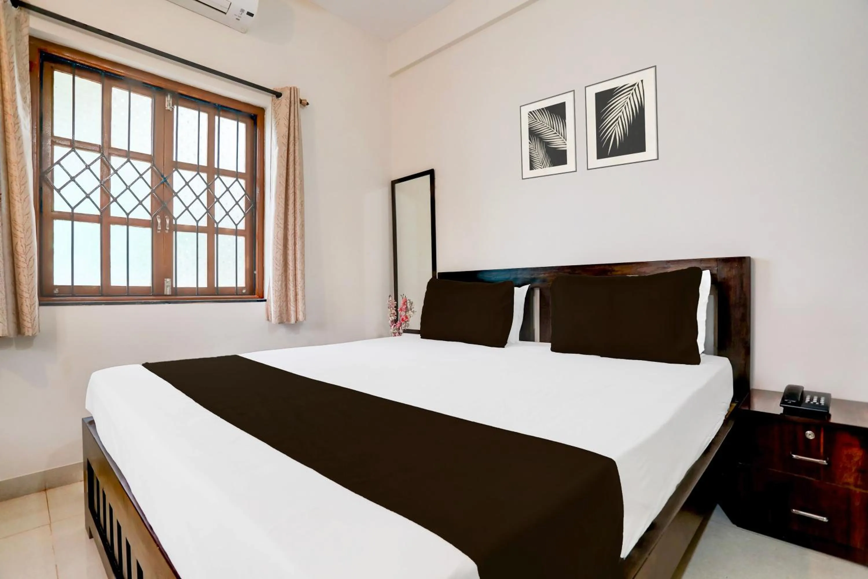 Bedroom in Hotel O Aqua Service Apartments