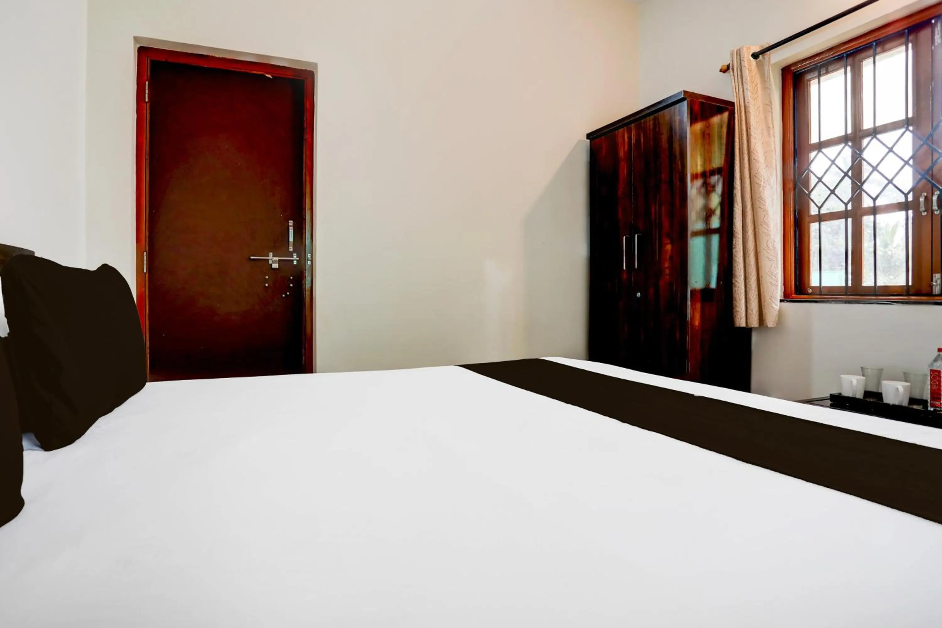 Bedroom in Hotel O Aqua Service Apartments