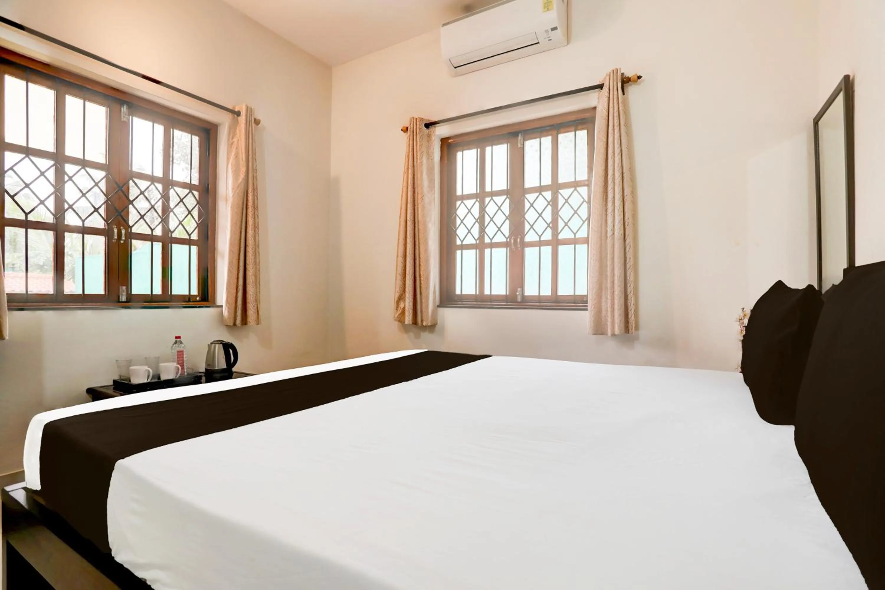 Bedroom in Hotel O Aqua Service Apartments