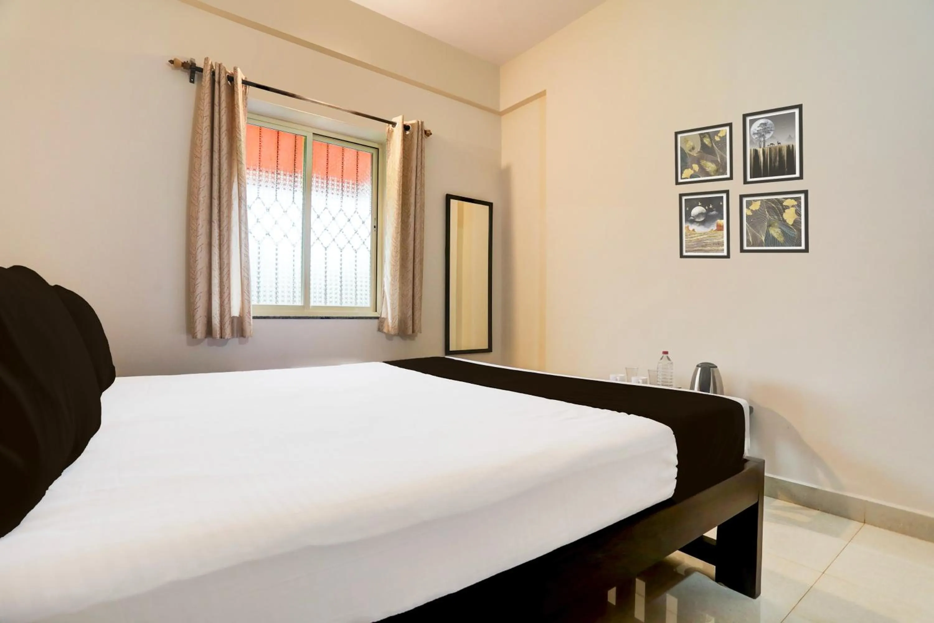 Bedroom in Hotel O Aqua Service Apartments