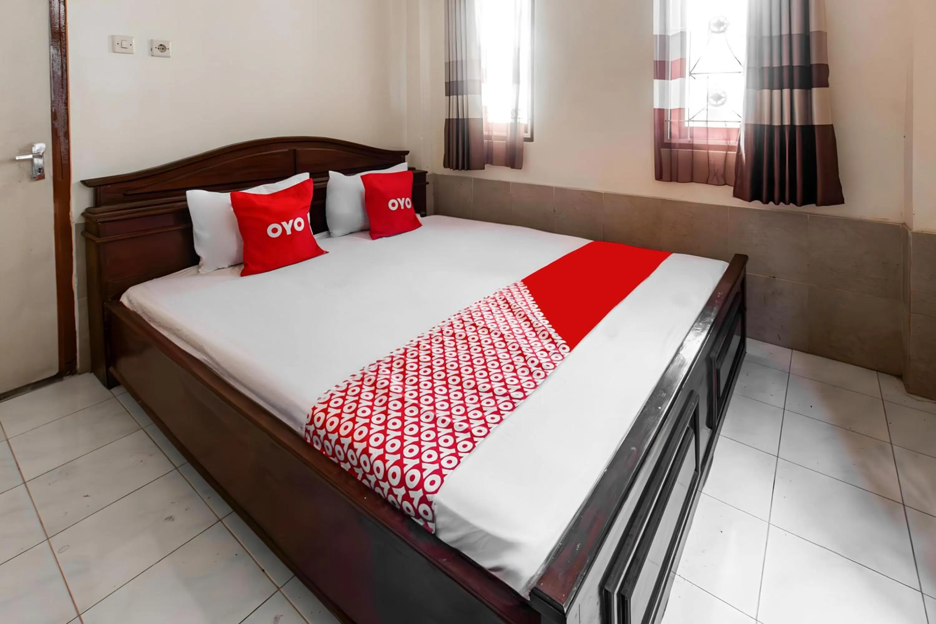 Bedroom in OYO 93582 Liani Homestay Syariah