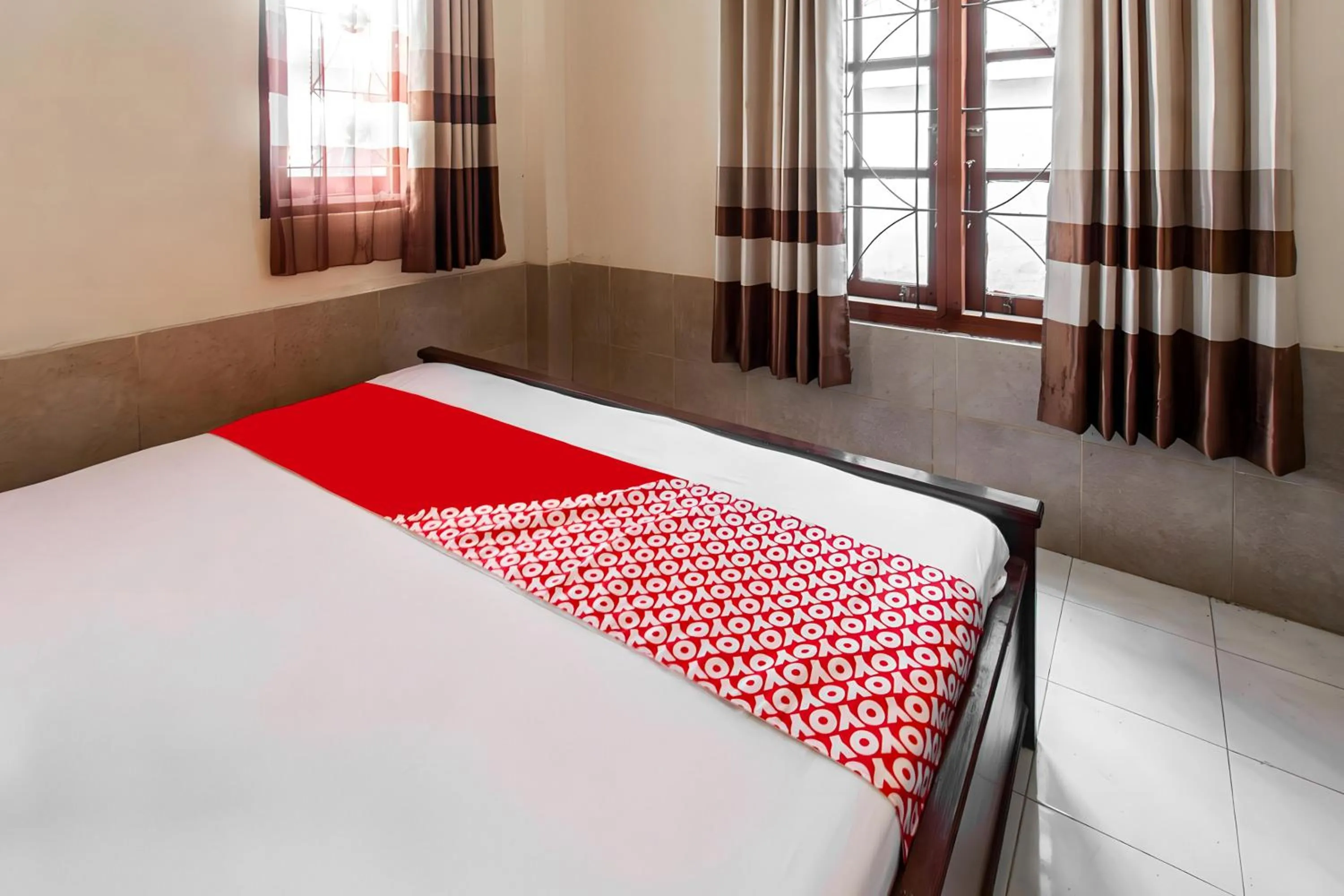 Bedroom in OYO 93582 Liani Homestay Syariah