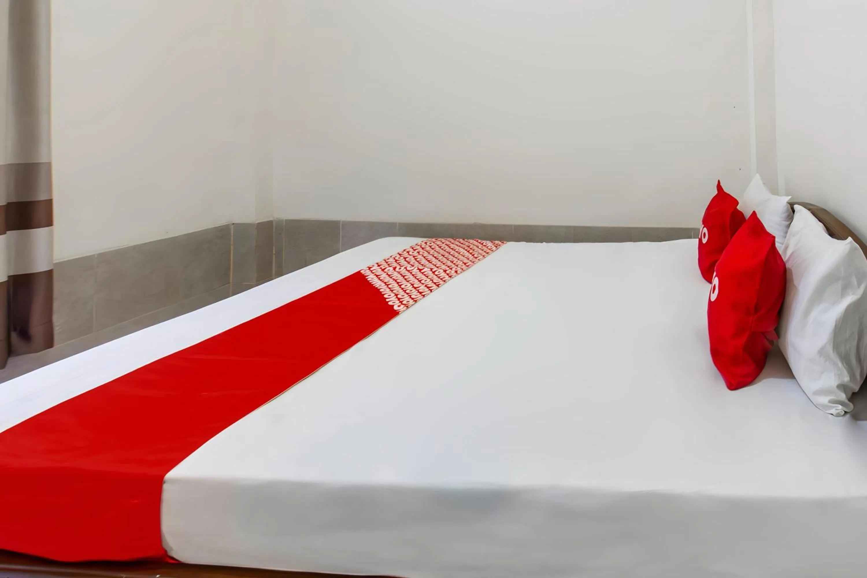 Bedroom in OYO 93582 Liani Homestay Syariah