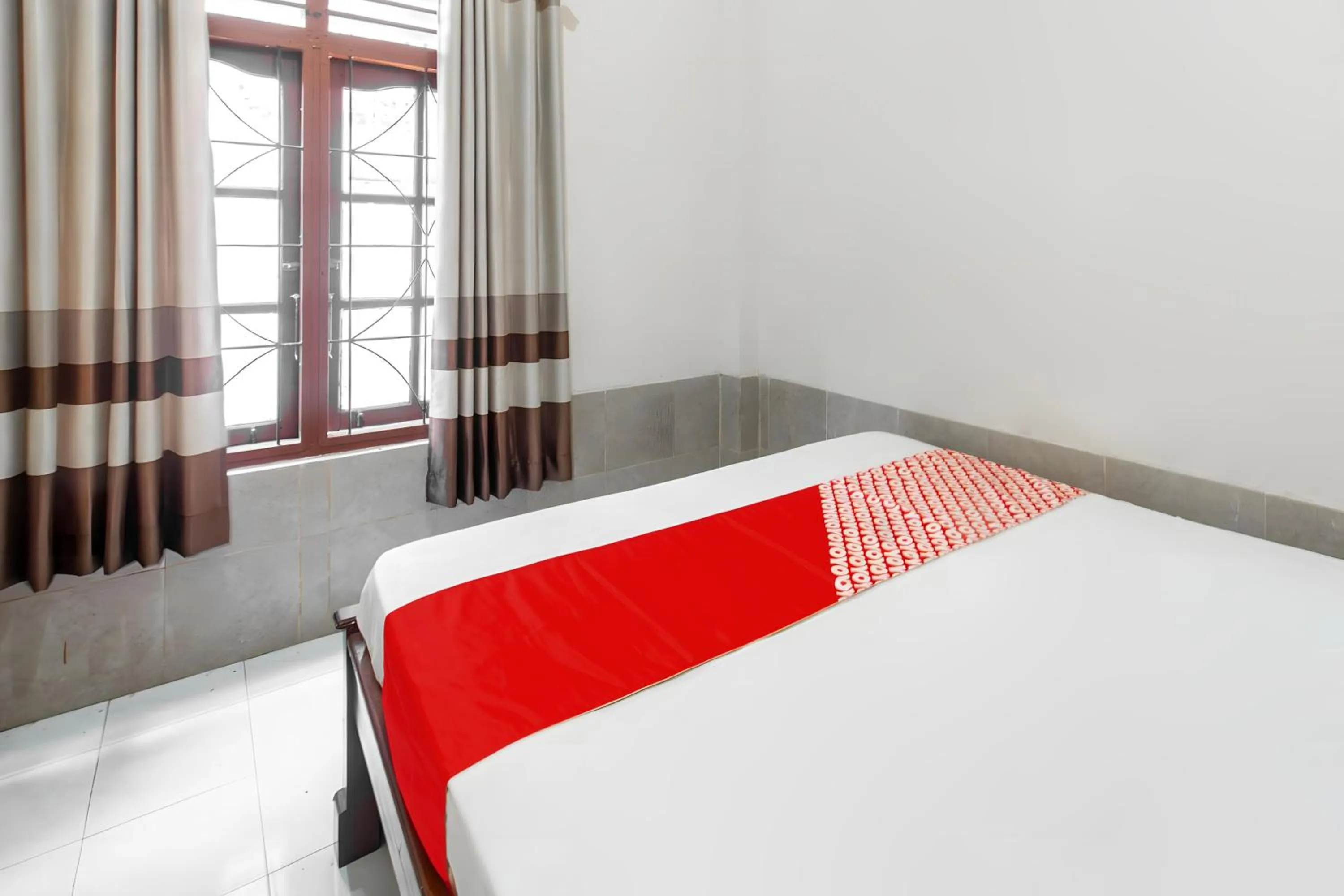 Bedroom in OYO 93582 Liani Homestay Syariah