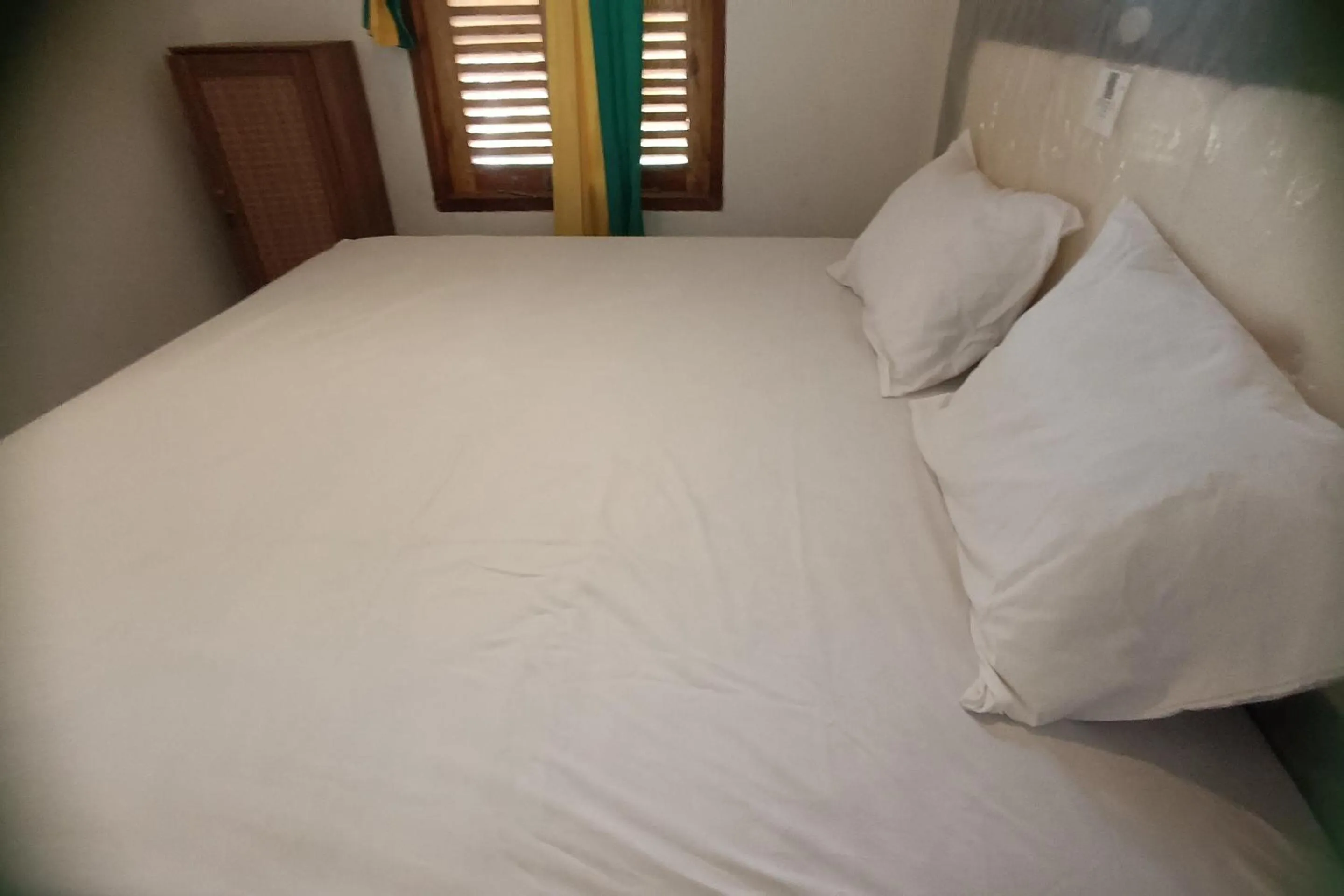 Bedroom in OYO 93626 Hi Homestay & Group