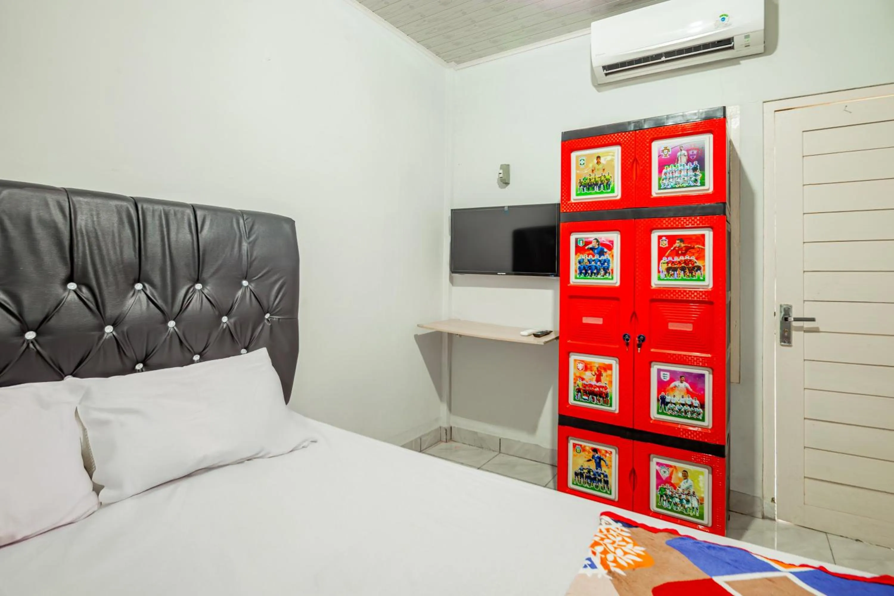 Bedroom in Hotel O Wongso Residence Syariah