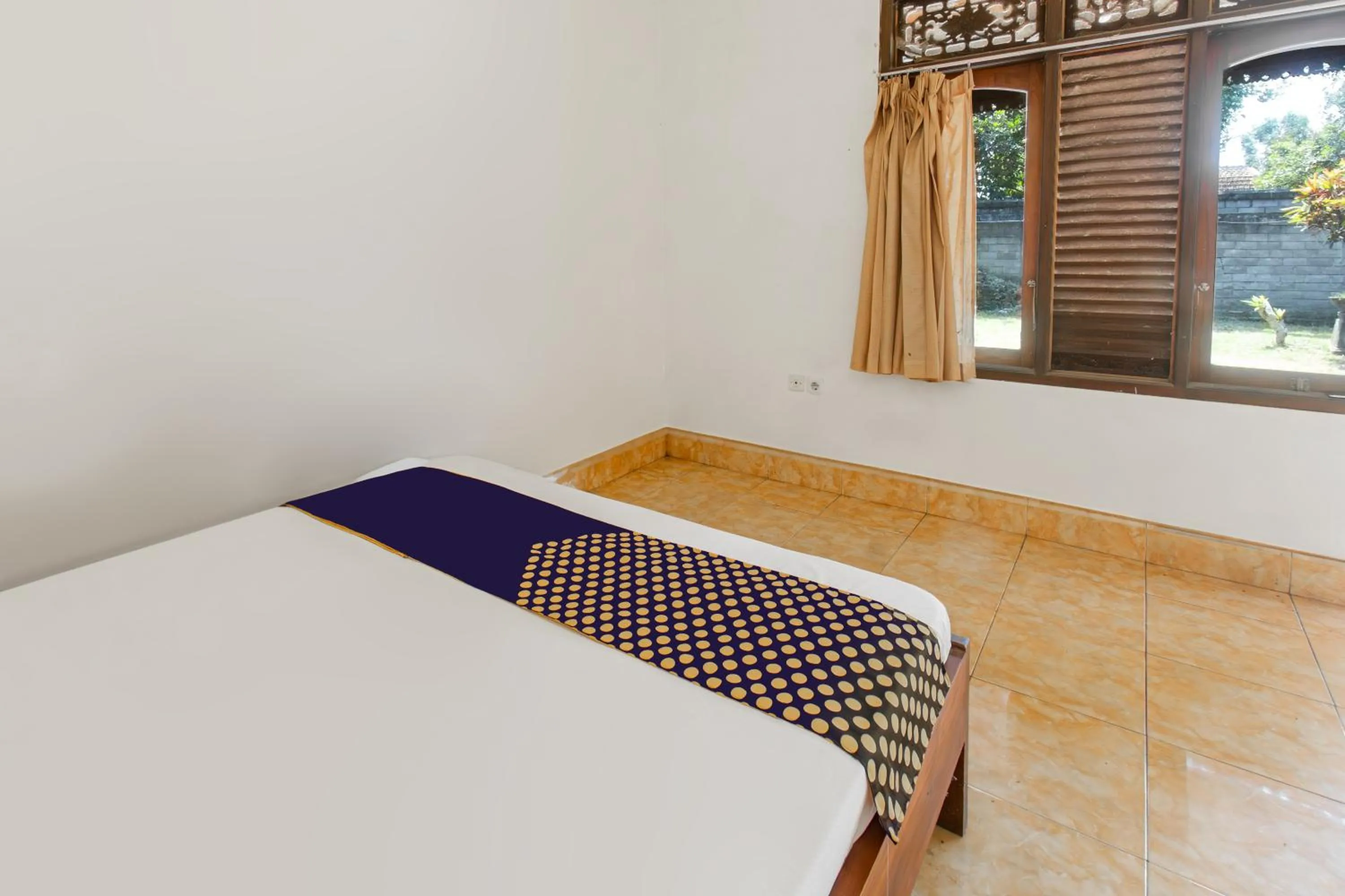 Bedroom, Bed in Hotel O Kaila Guesthouse