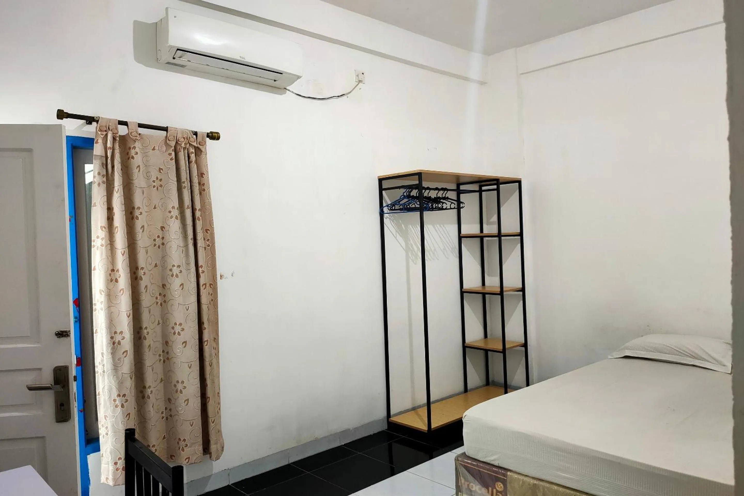 Bedroom in Hotel O Pondok Baruga 777 Near Sarewo Musik Studio Kendari