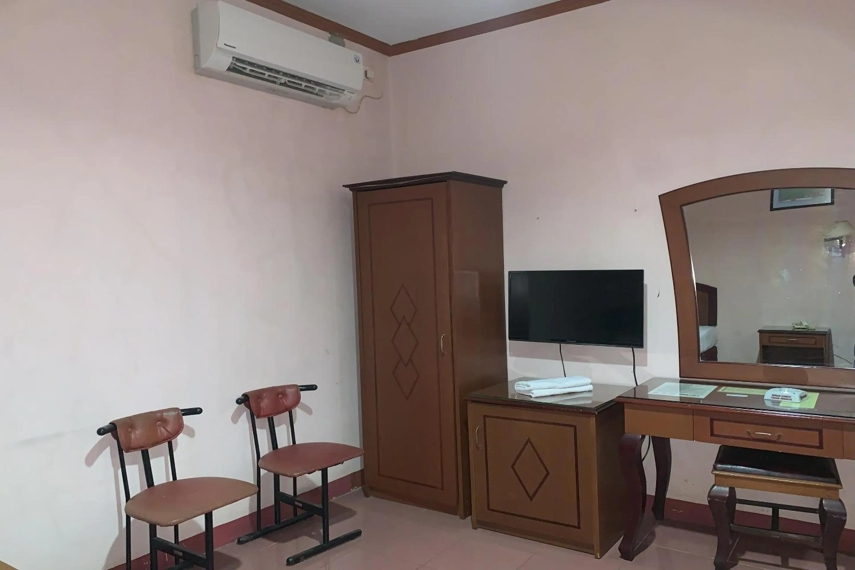 Bedroom in Hotel O Pondok Baruga 777 Near Sarewo Musik Studio Kendari