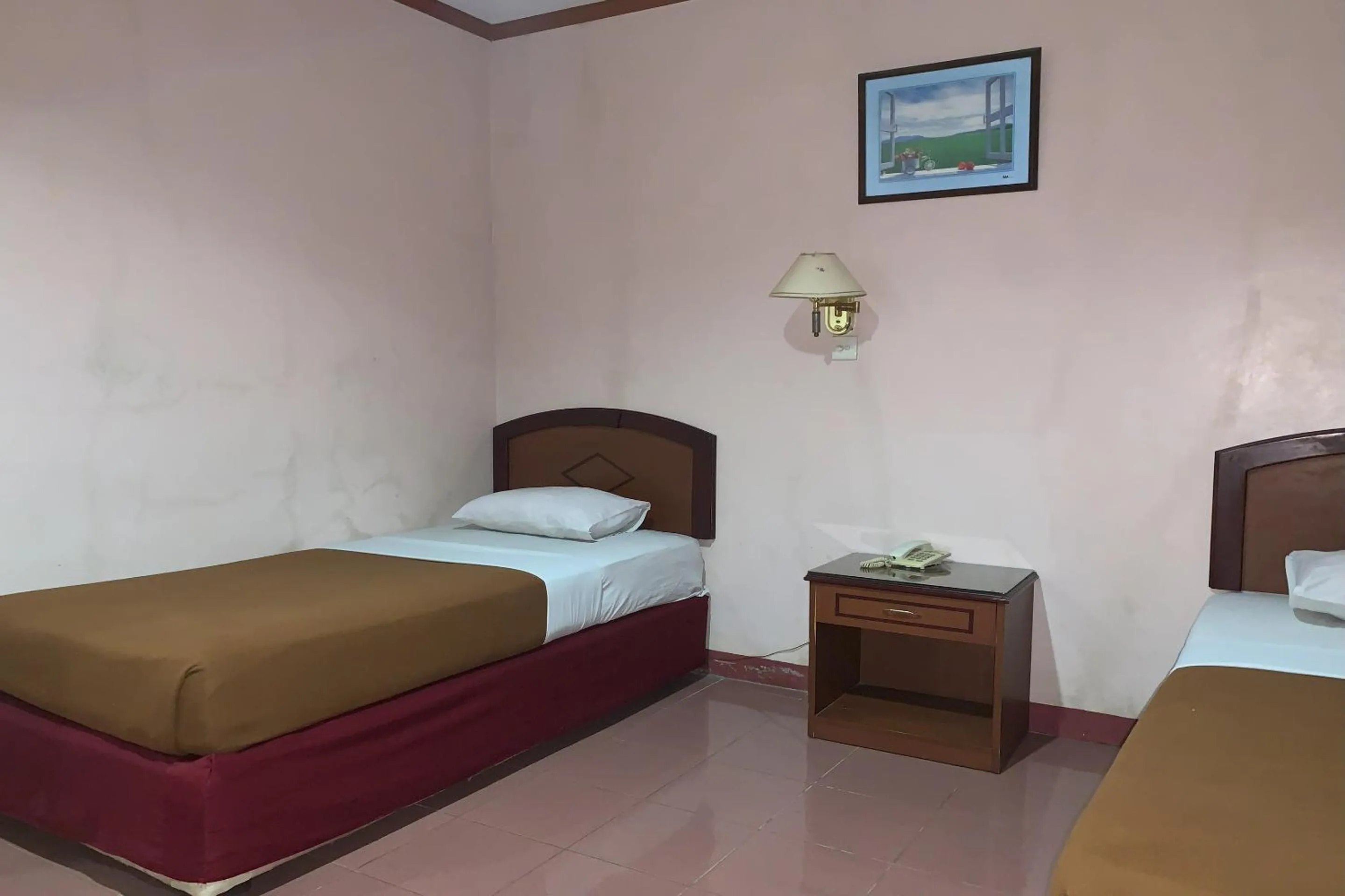 Bedroom in Hotel O Pondok Baruga 777 Near Sarewo Musik Studio Kendari