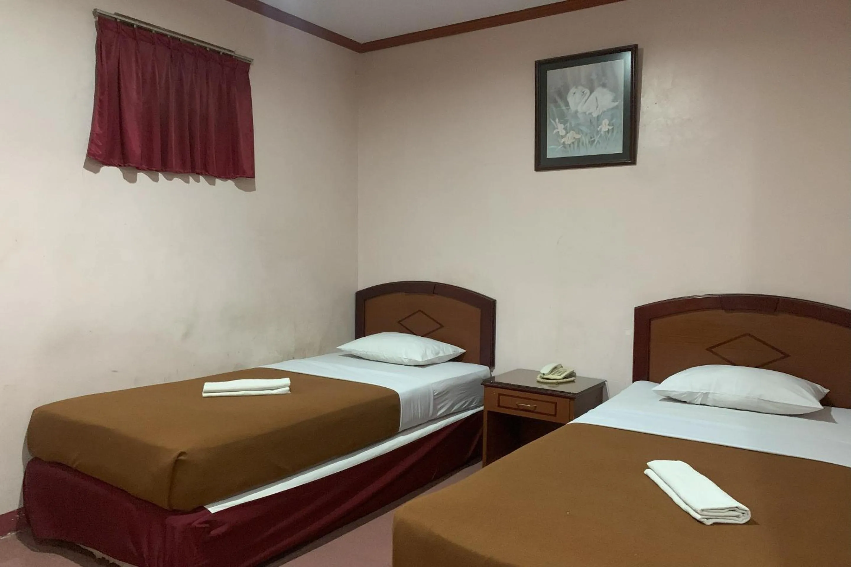 Bedroom in Hotel O Pondok Baruga 777 Near Sarewo Musik Studio Kendari