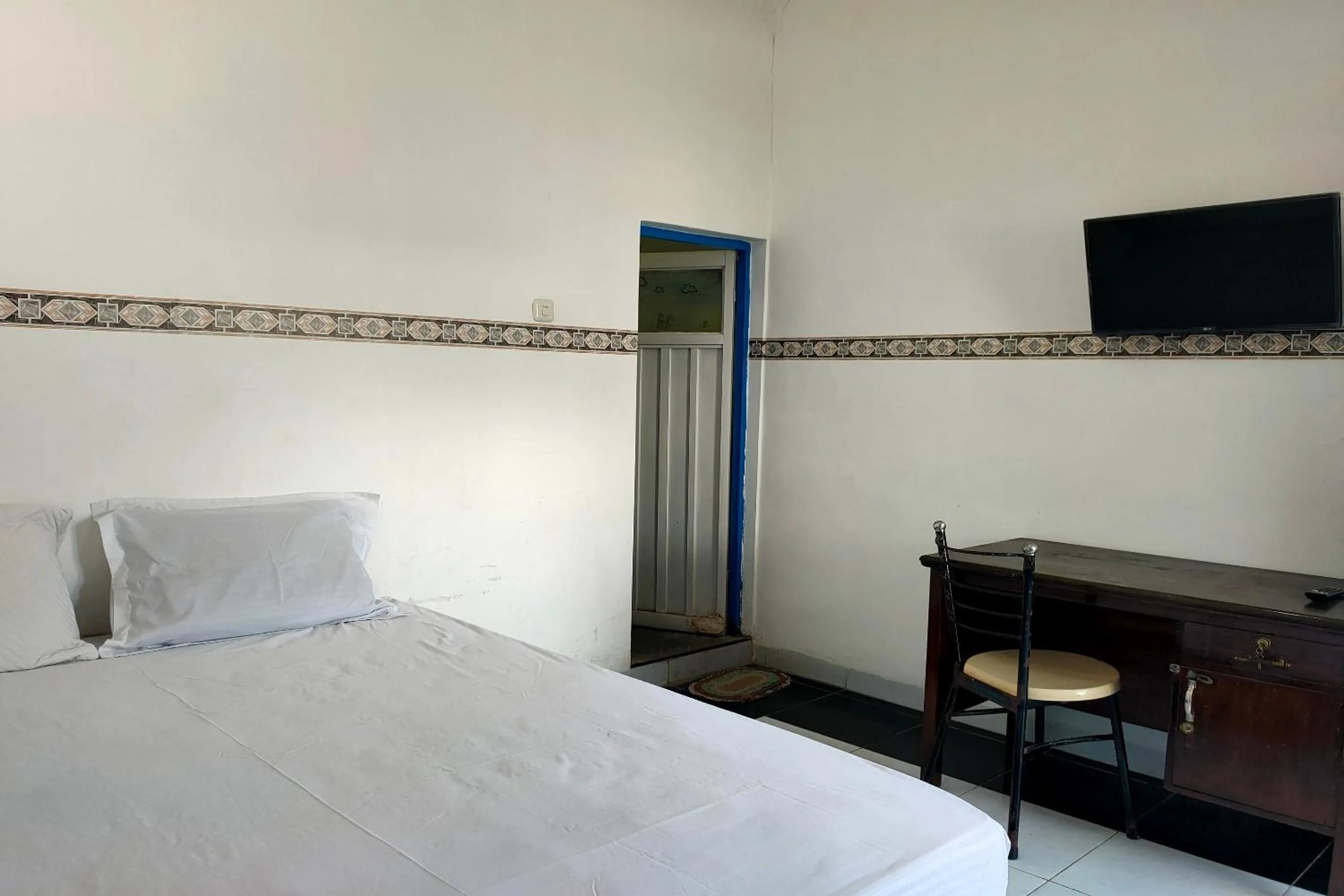 Bedroom in Hotel O Pondok Baruga 777 Near Sarewo Musik Studio Kendari