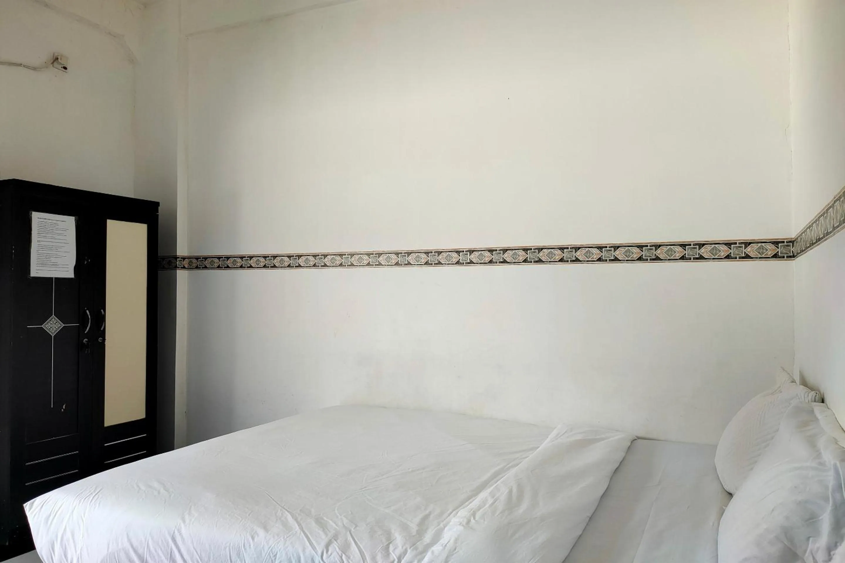 Bedroom in Hotel O Pondok Baruga 777 Near Sarewo Musik Studio Kendari