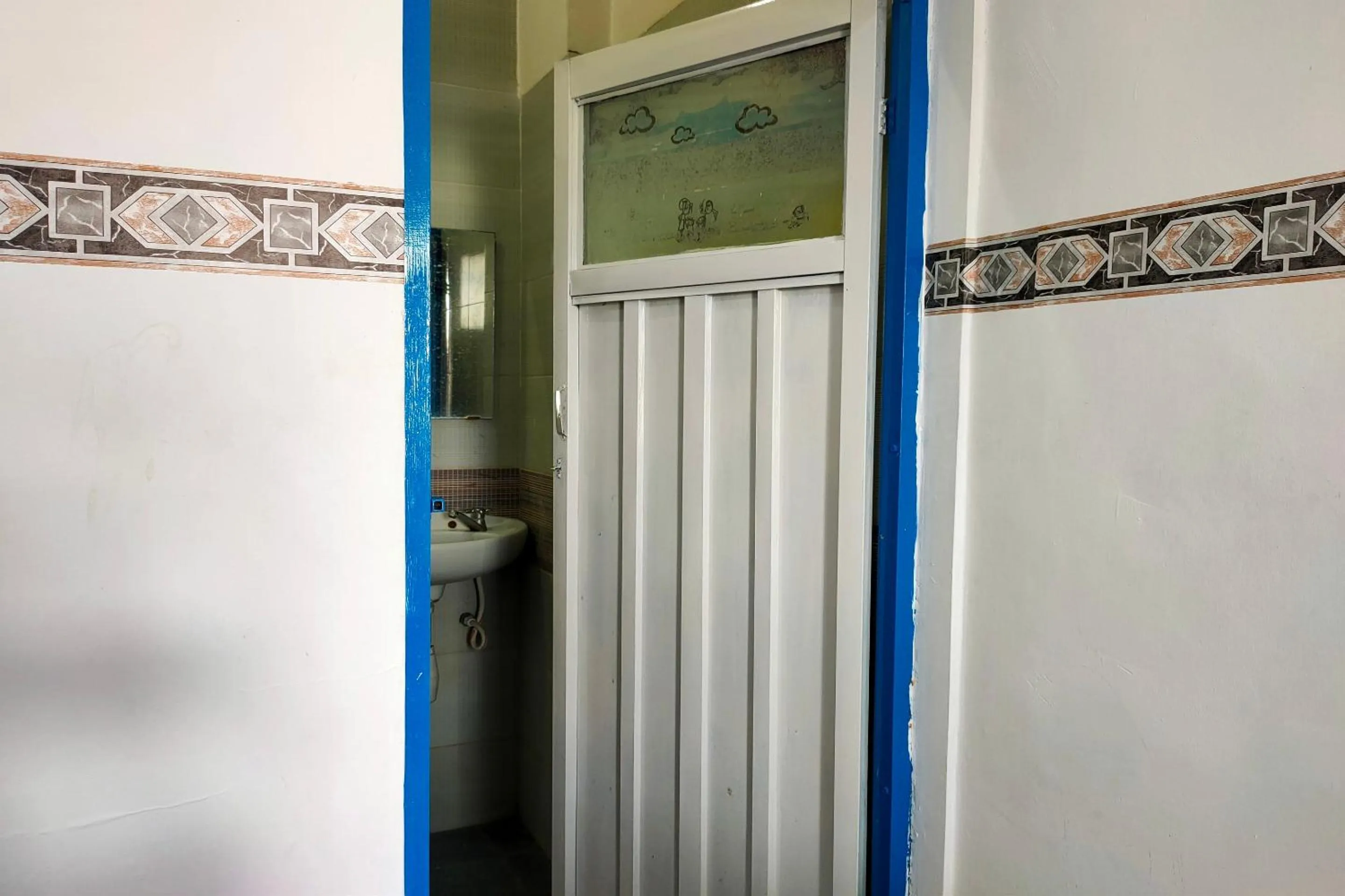 Bedroom in Hotel O Pondok Baruga 777 Near Sarewo Musik Studio Kendari