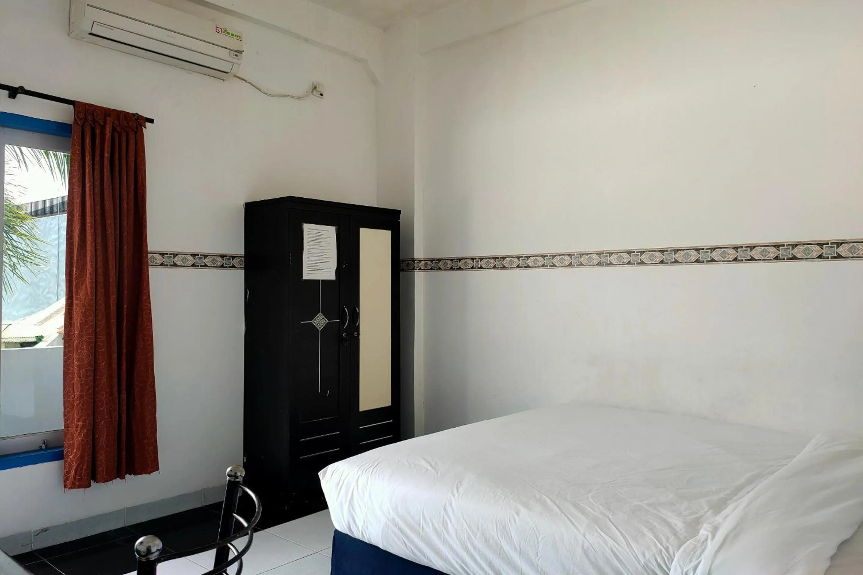 Bedroom in Hotel O Pondok Baruga 777 Near Sarewo Musik Studio Kendari