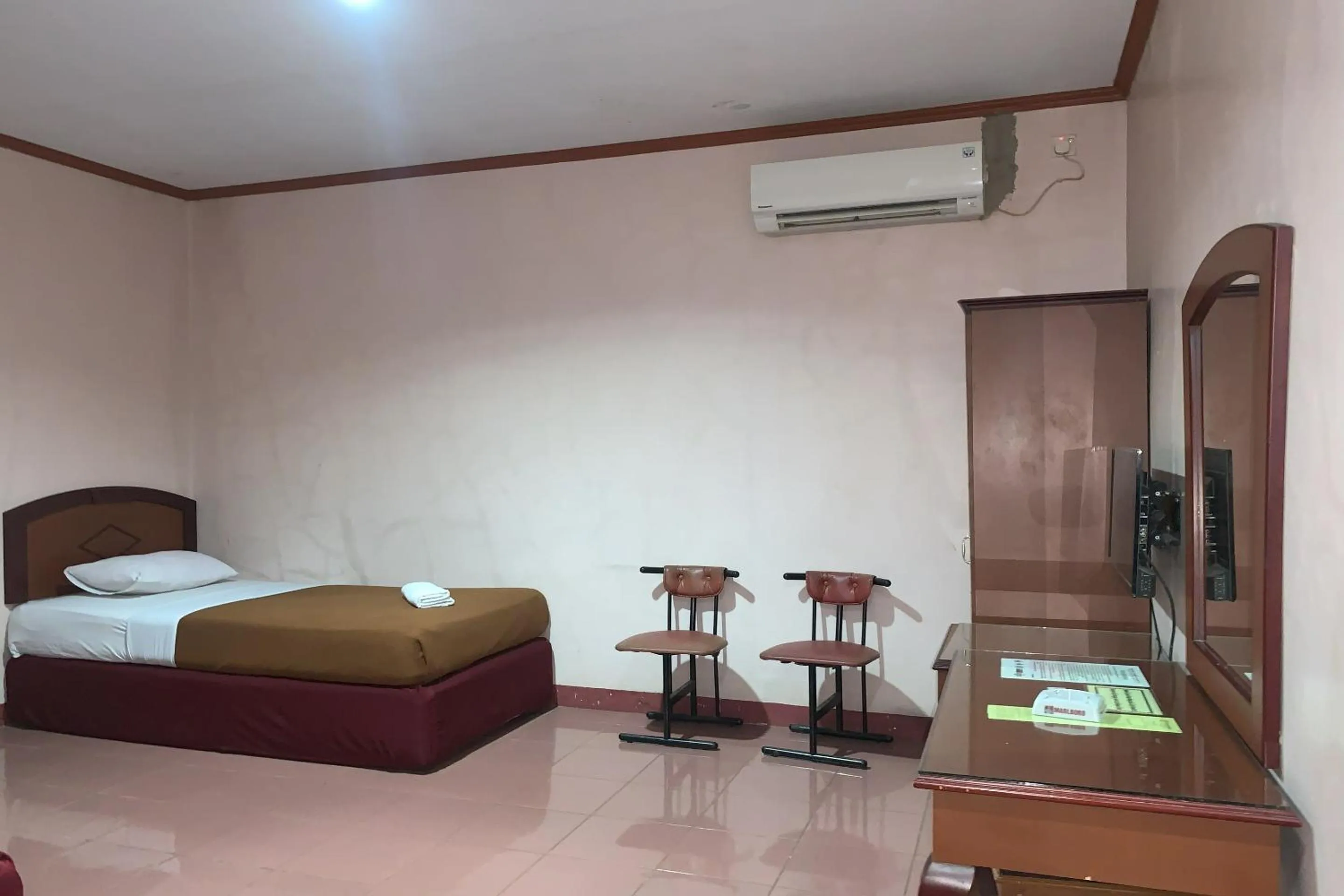 Bedroom in Hotel O Pondok Baruga 777 Near Sarewo Musik Studio Kendari