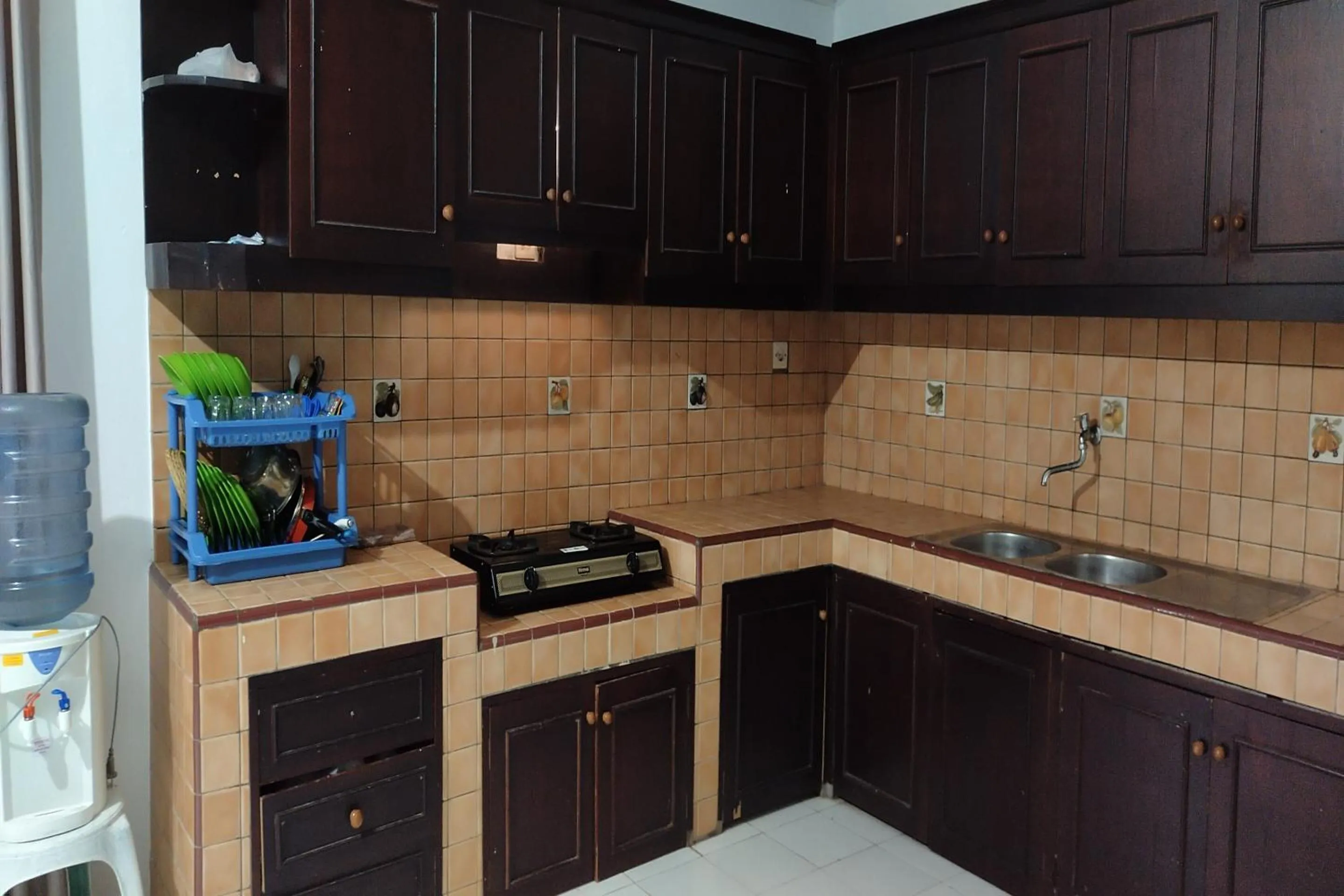 Kitchen or kitchenette in Hotel O Karunia Kost & PenginapanNearSiring Marabahan (Ulek Barito)