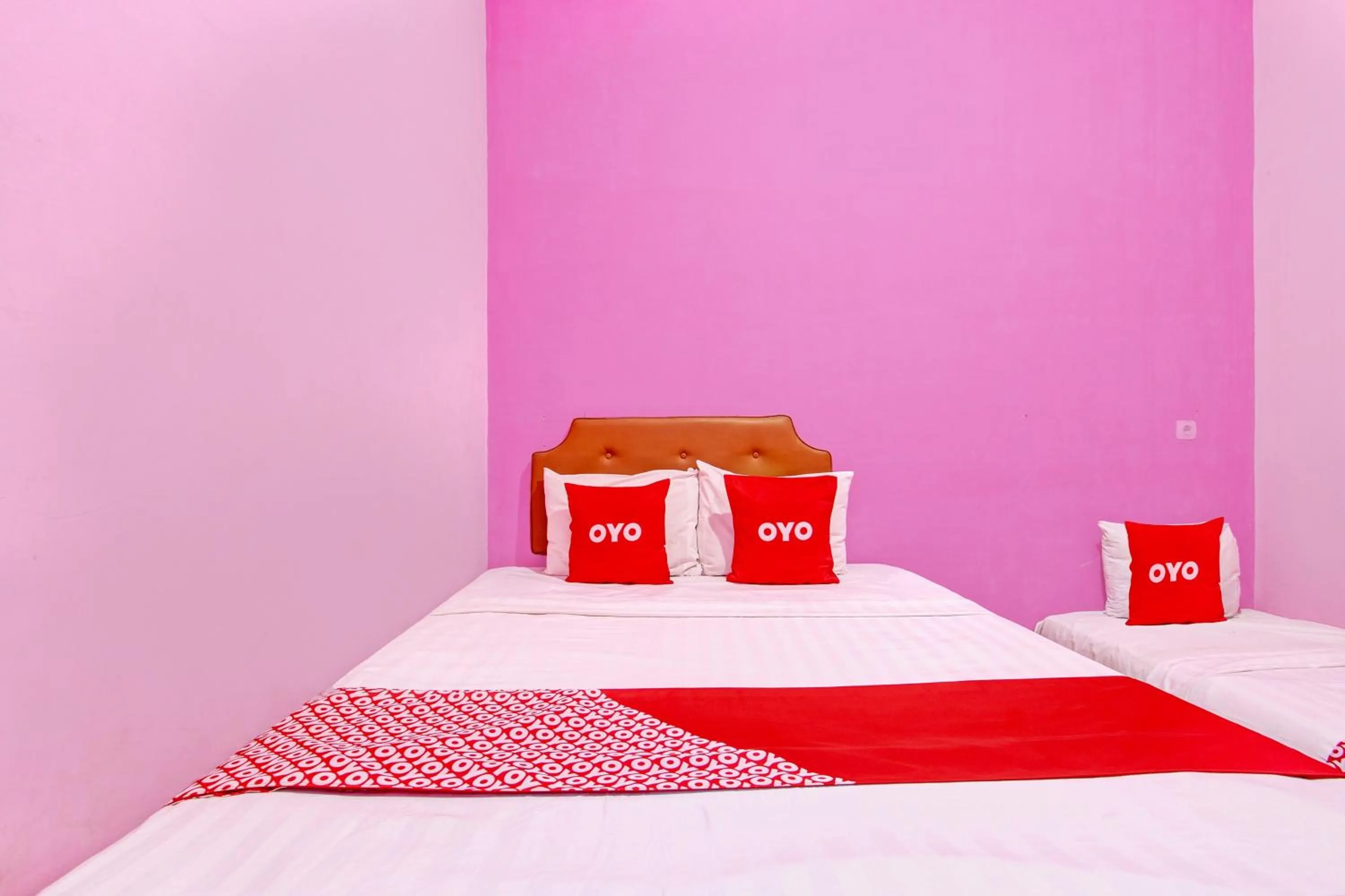 Bedroom in OYO 93660 New Family Hotel Syariah