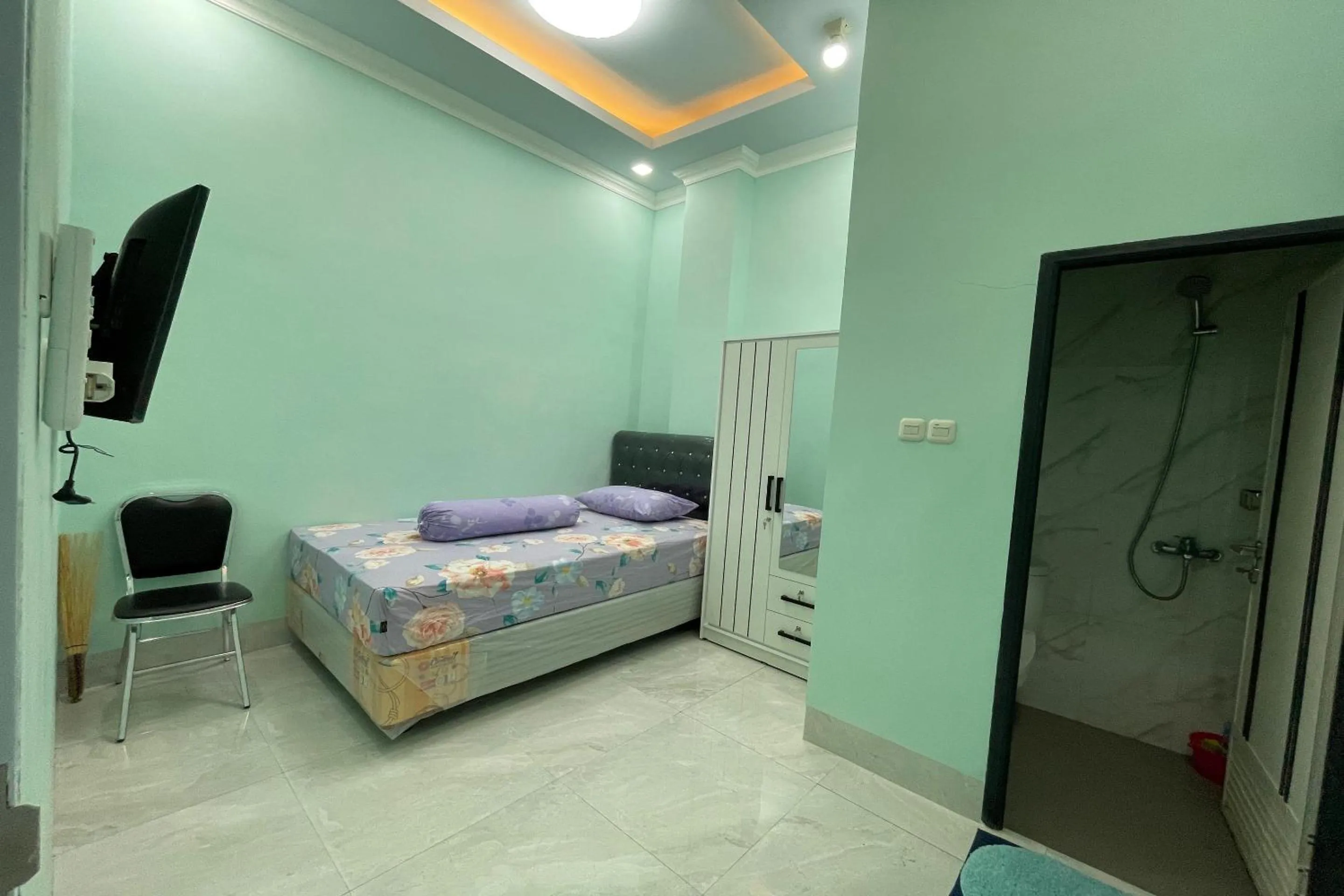 Bedroom, Bed in Hotel O Homestay Purirano