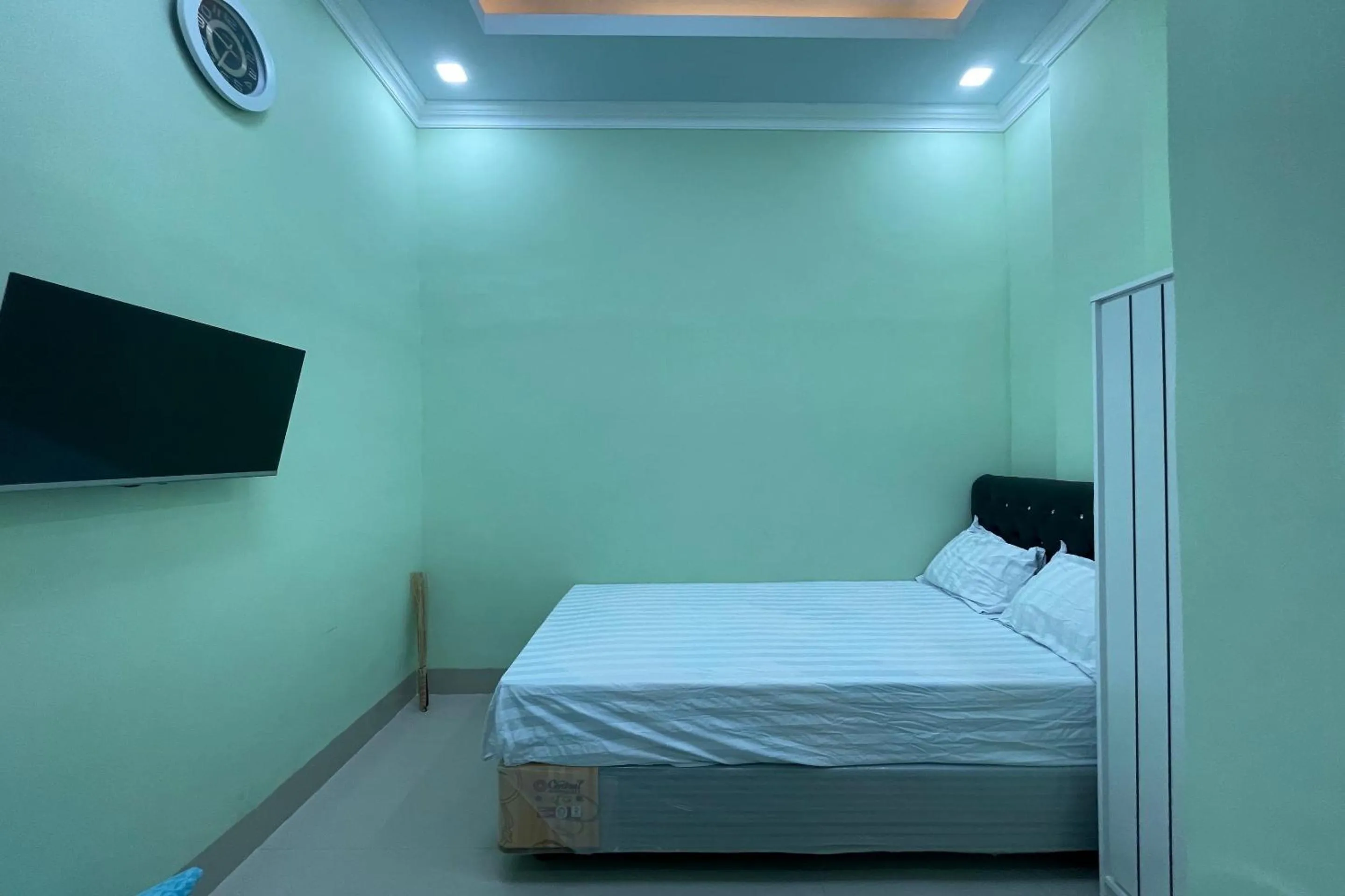 Bedroom, Bed in Hotel O Homestay Purirano