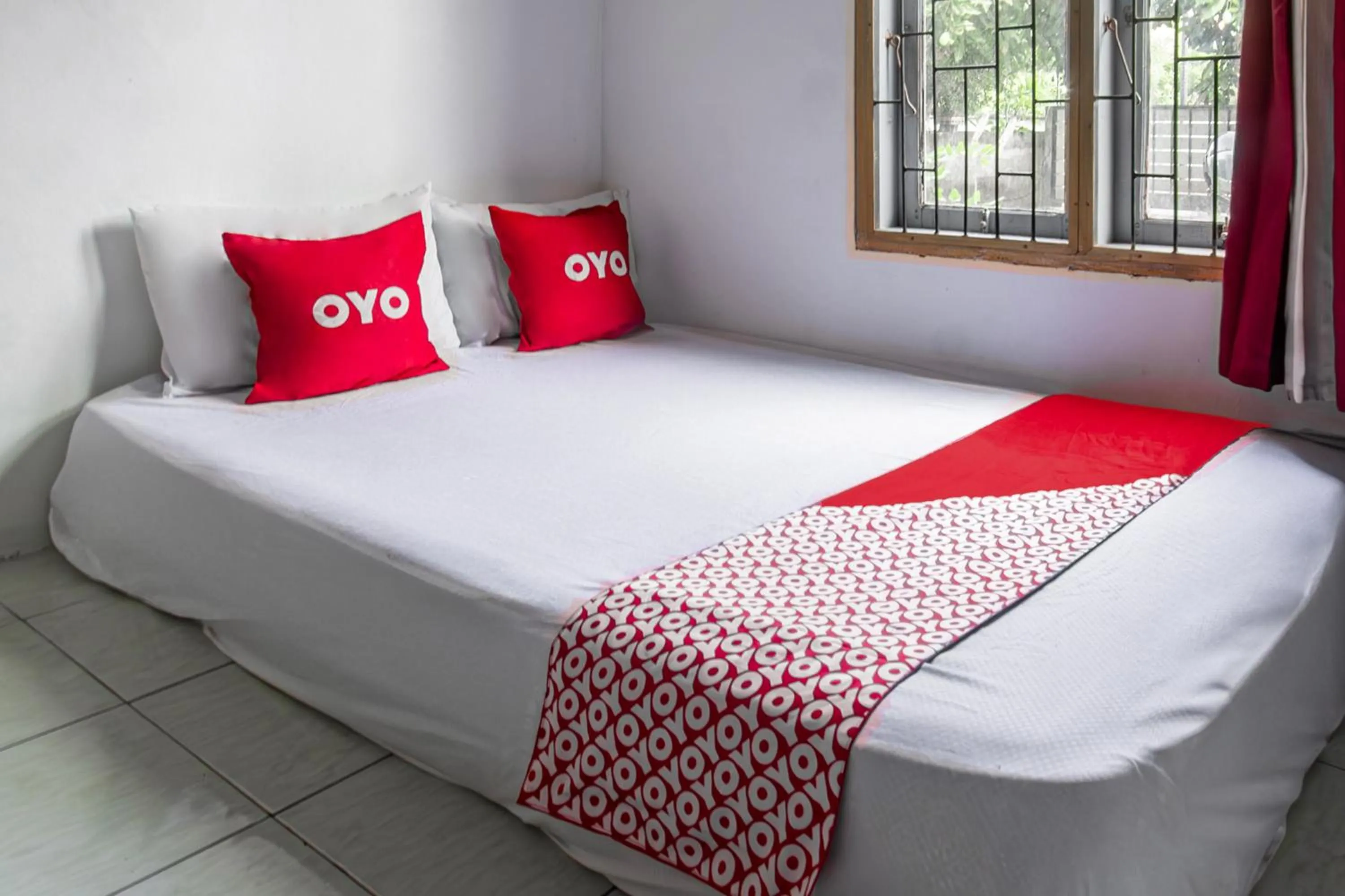 Bedroom, Bed in Hotel O Lestari Homestay