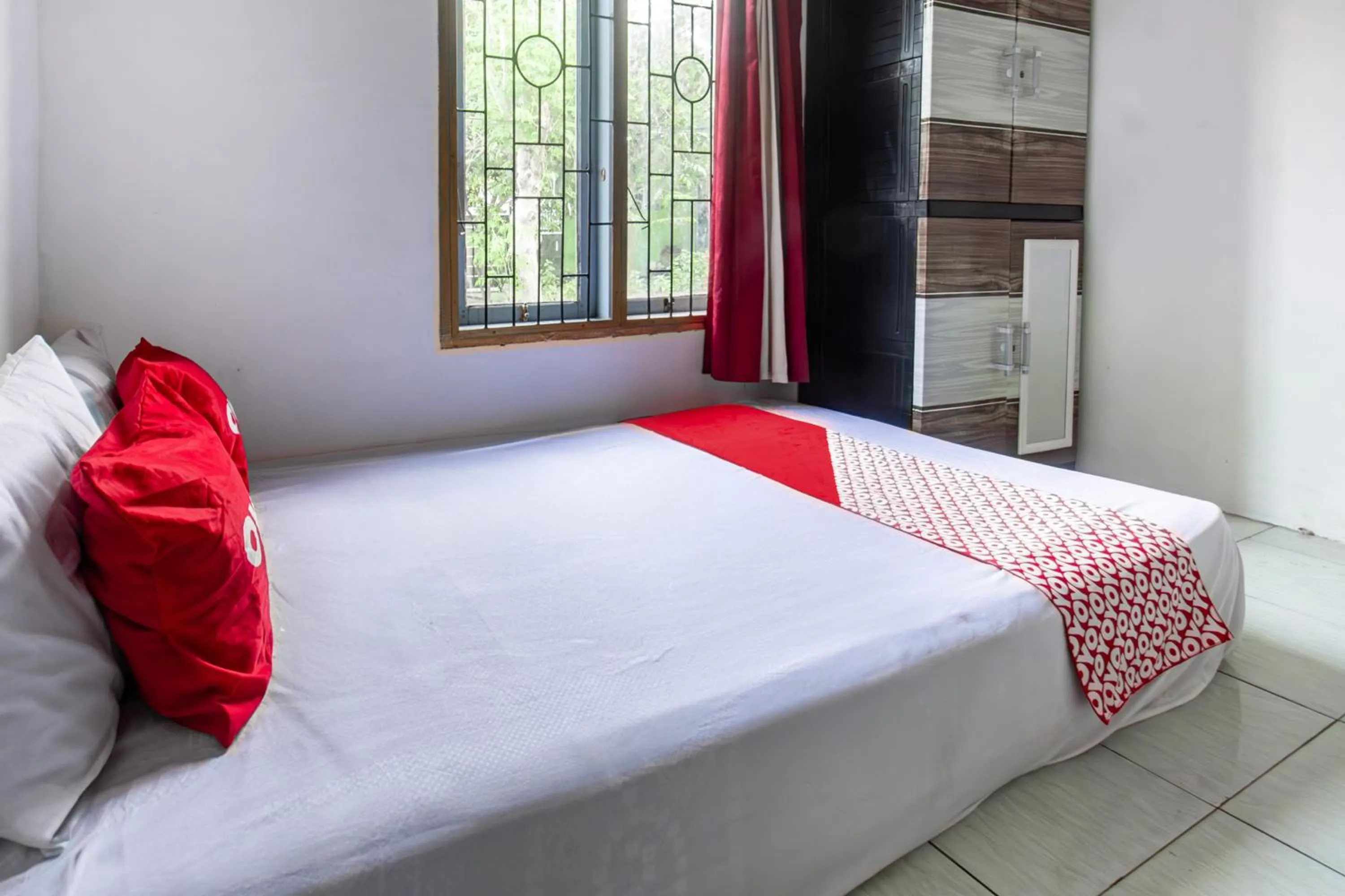 Bedroom, Bed in Hotel O Lestari Homestay