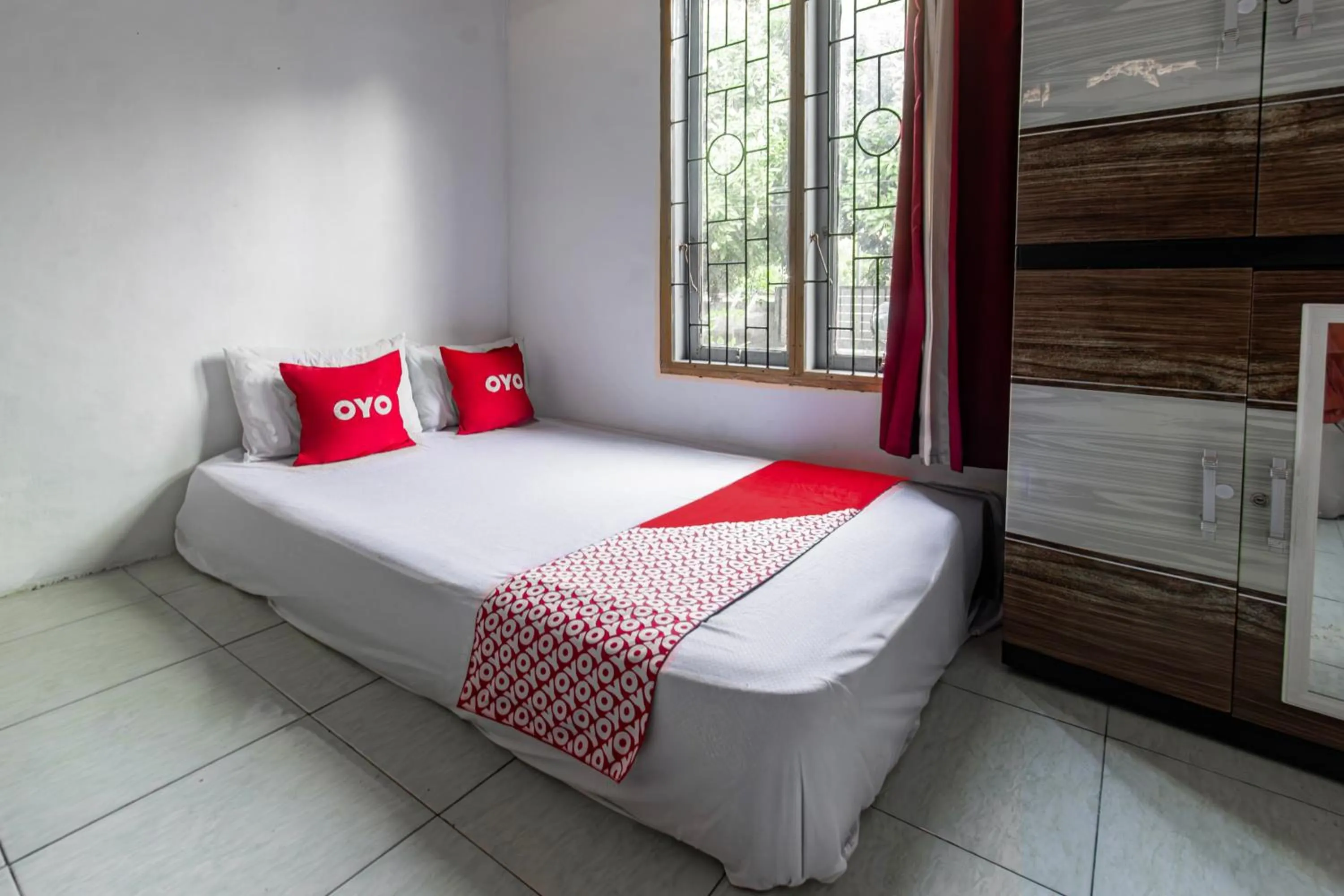 Bedroom, Bed in Hotel O Lestari Homestay