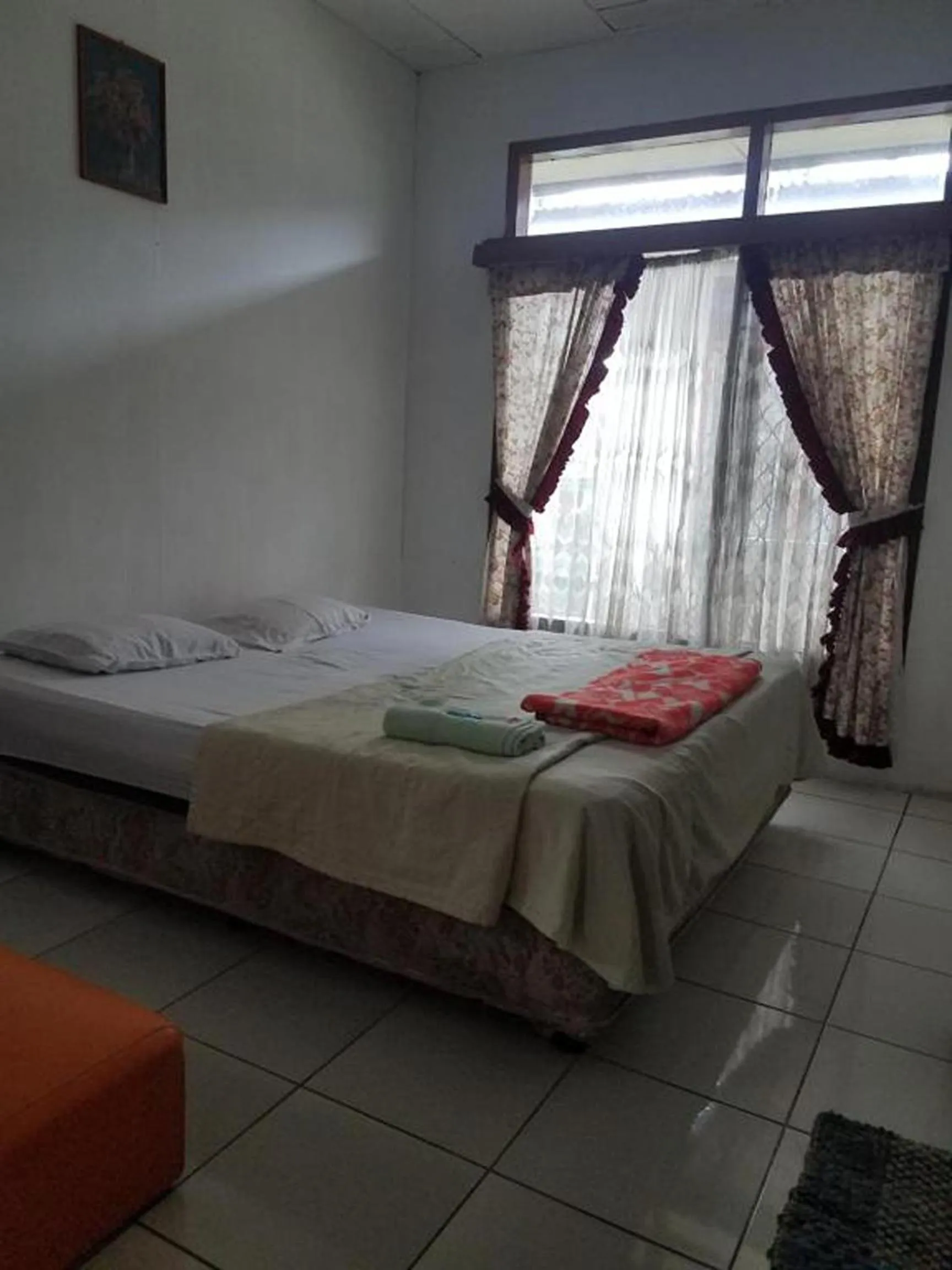 Bed in Kaliaga Bungalow