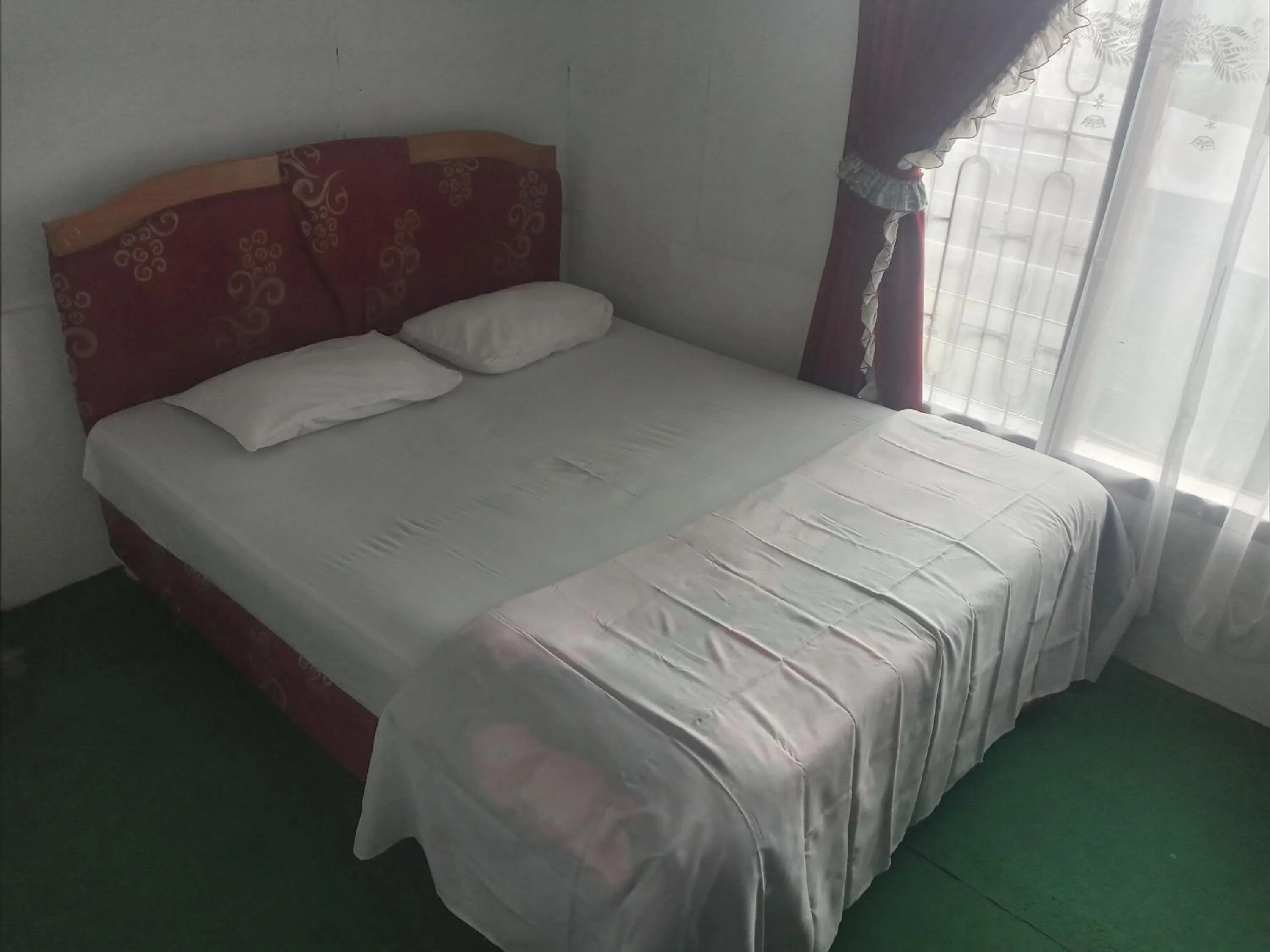 Bed in Kaliaga Bungalow