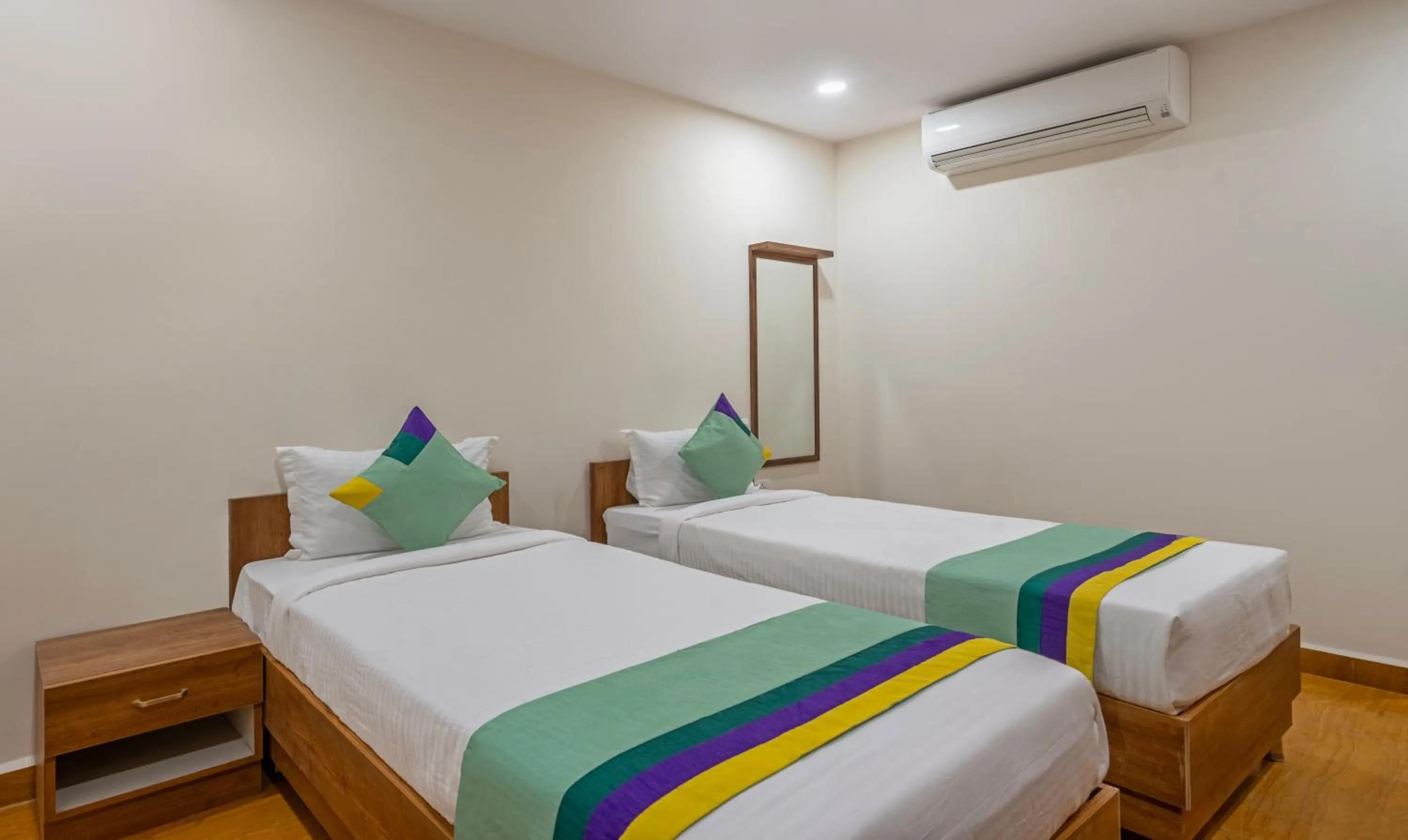 Bedroom, Bed in Treebo SY Inn, Gachibowli DLF