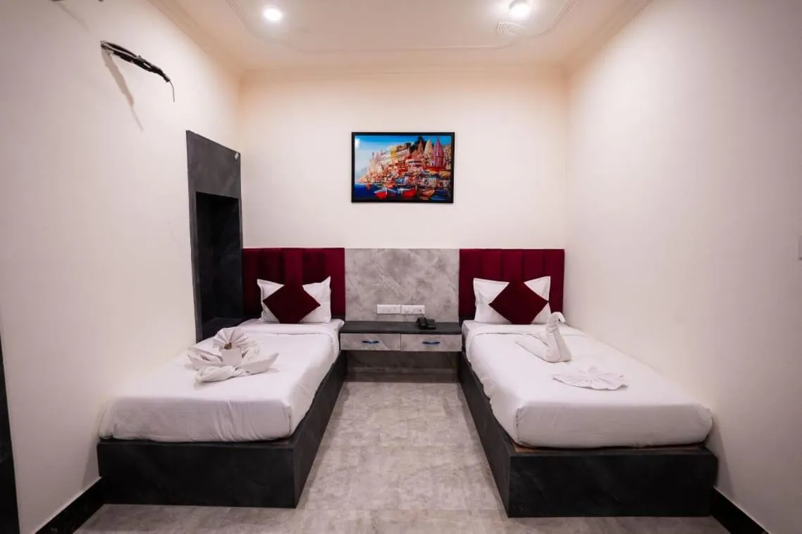 Bed in HOTEL JSR KEDAR