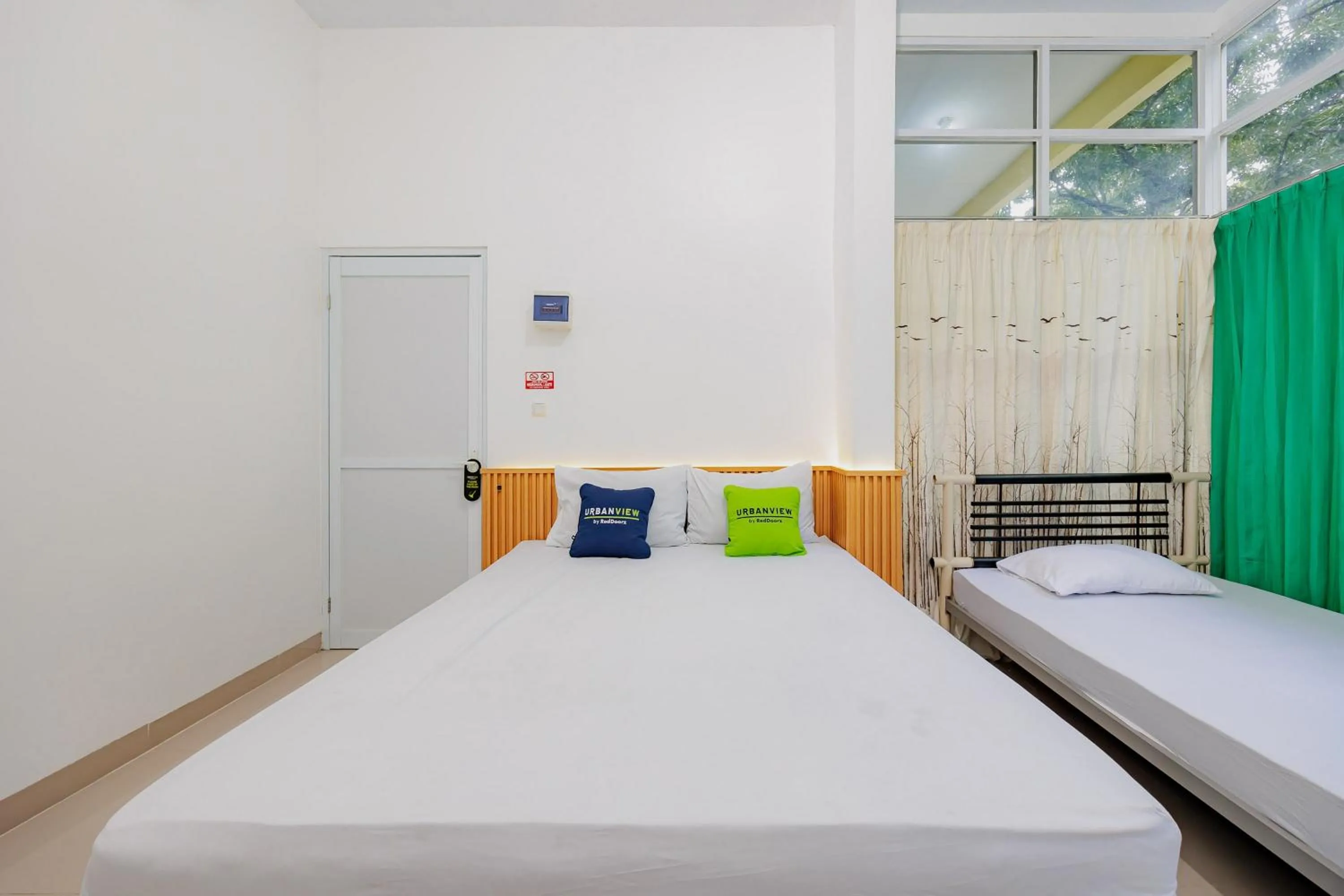 Bedroom, Bed in Urbanview Hotel BSD City