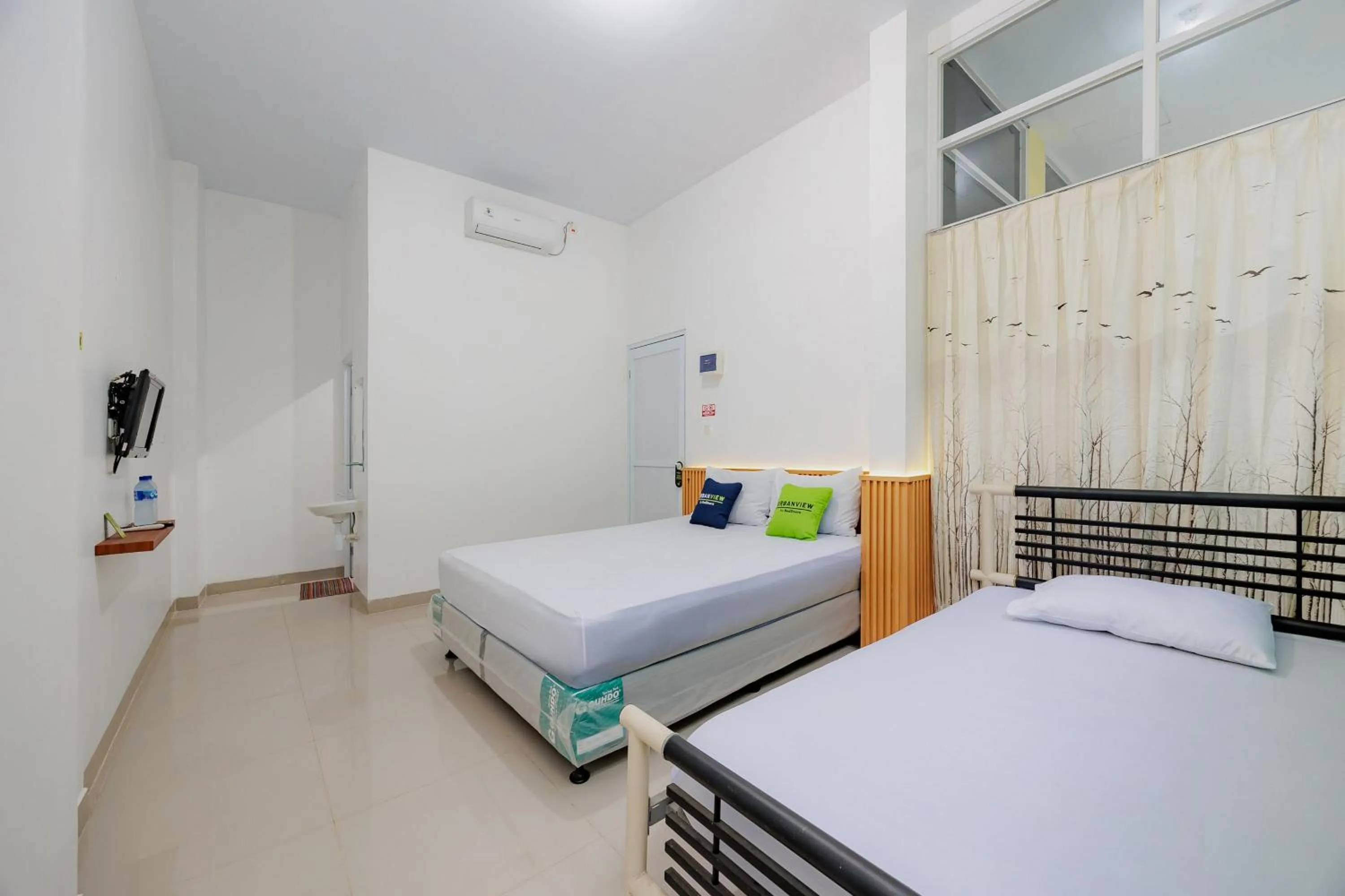 Bedroom, Bed in Urbanview Hotel BSD City