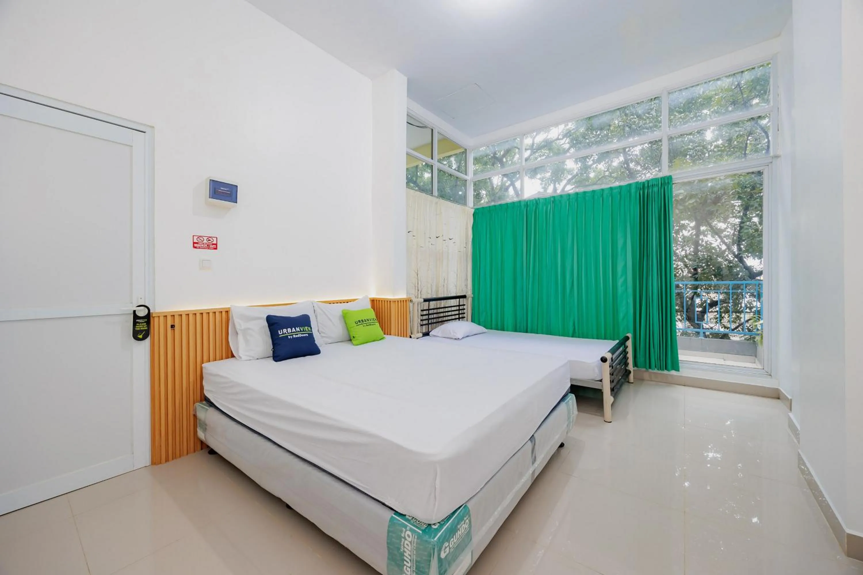 Bedroom, Bed in Urbanview Hotel BSD City