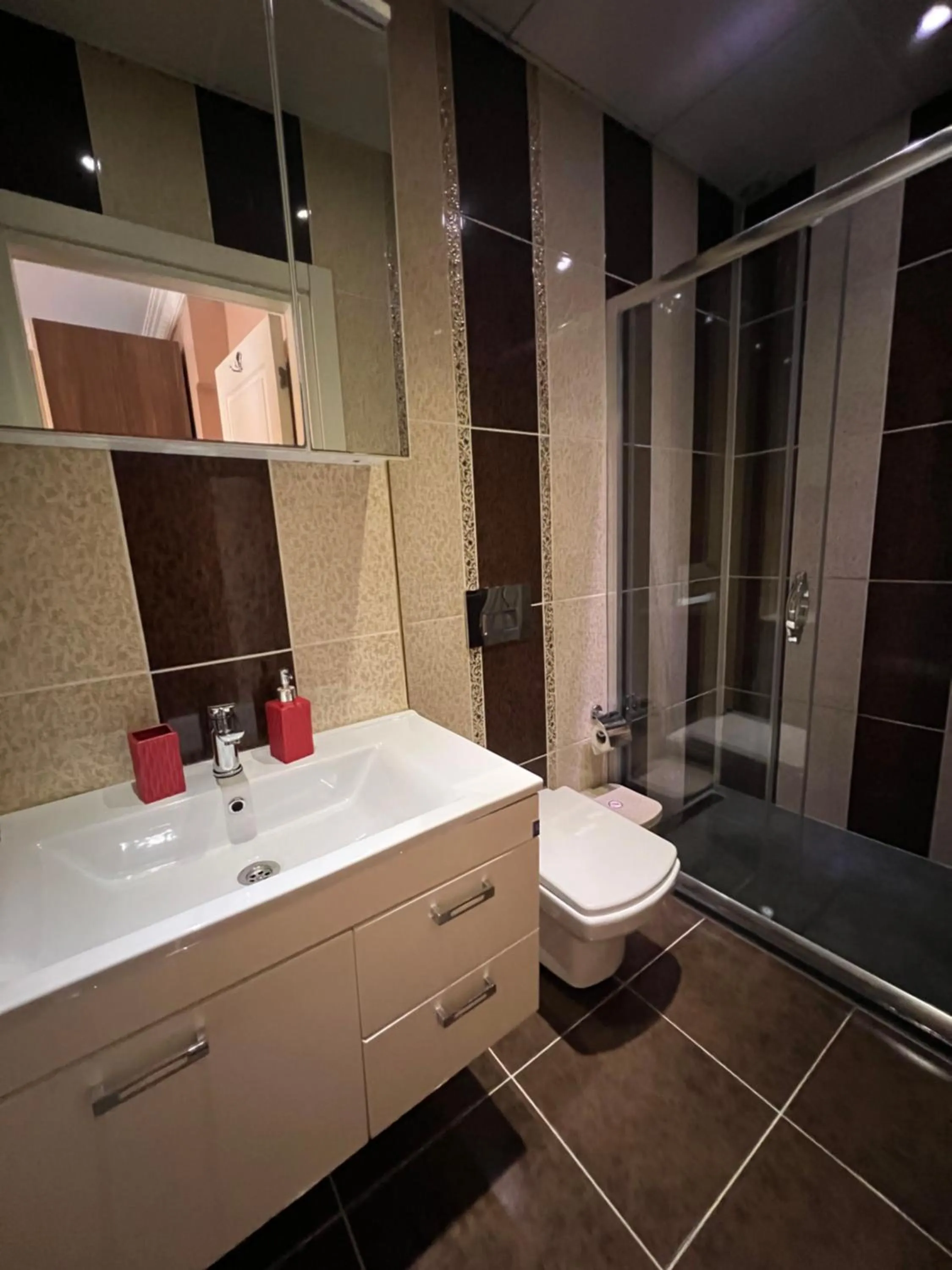 Bathroom in Zendy Suite Hotel