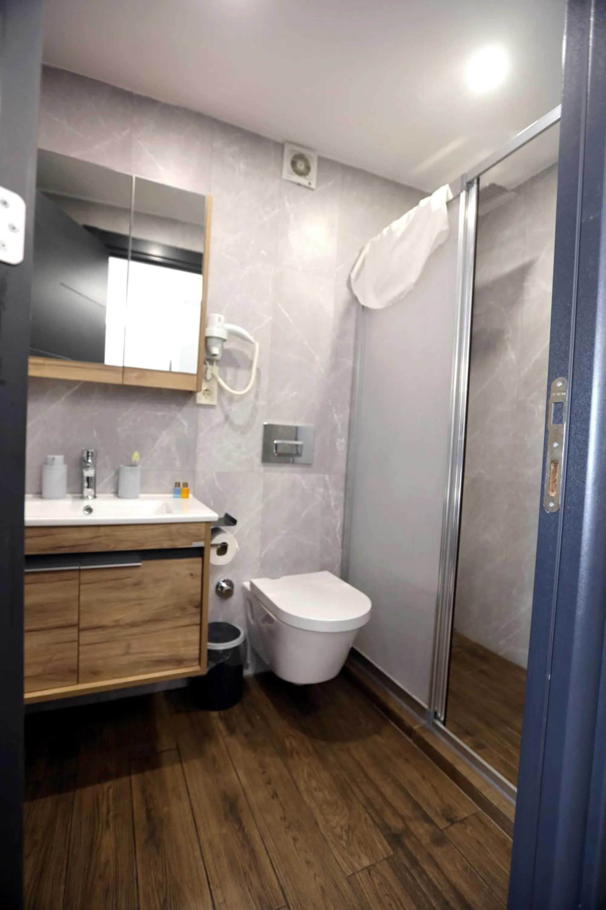 Bathroom in Zendy Suite Hotel