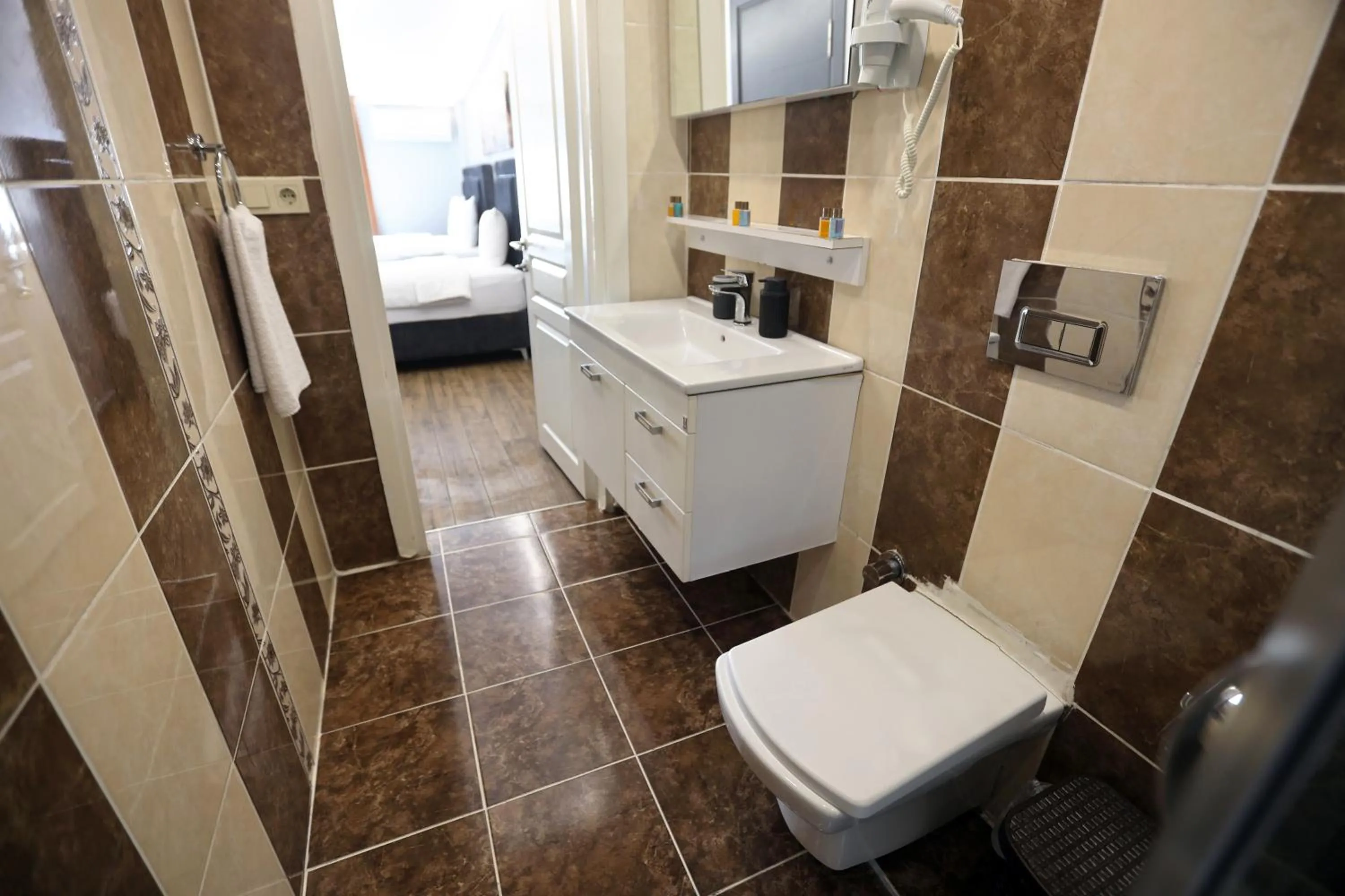 Bathroom in Zendy Suite Hotel