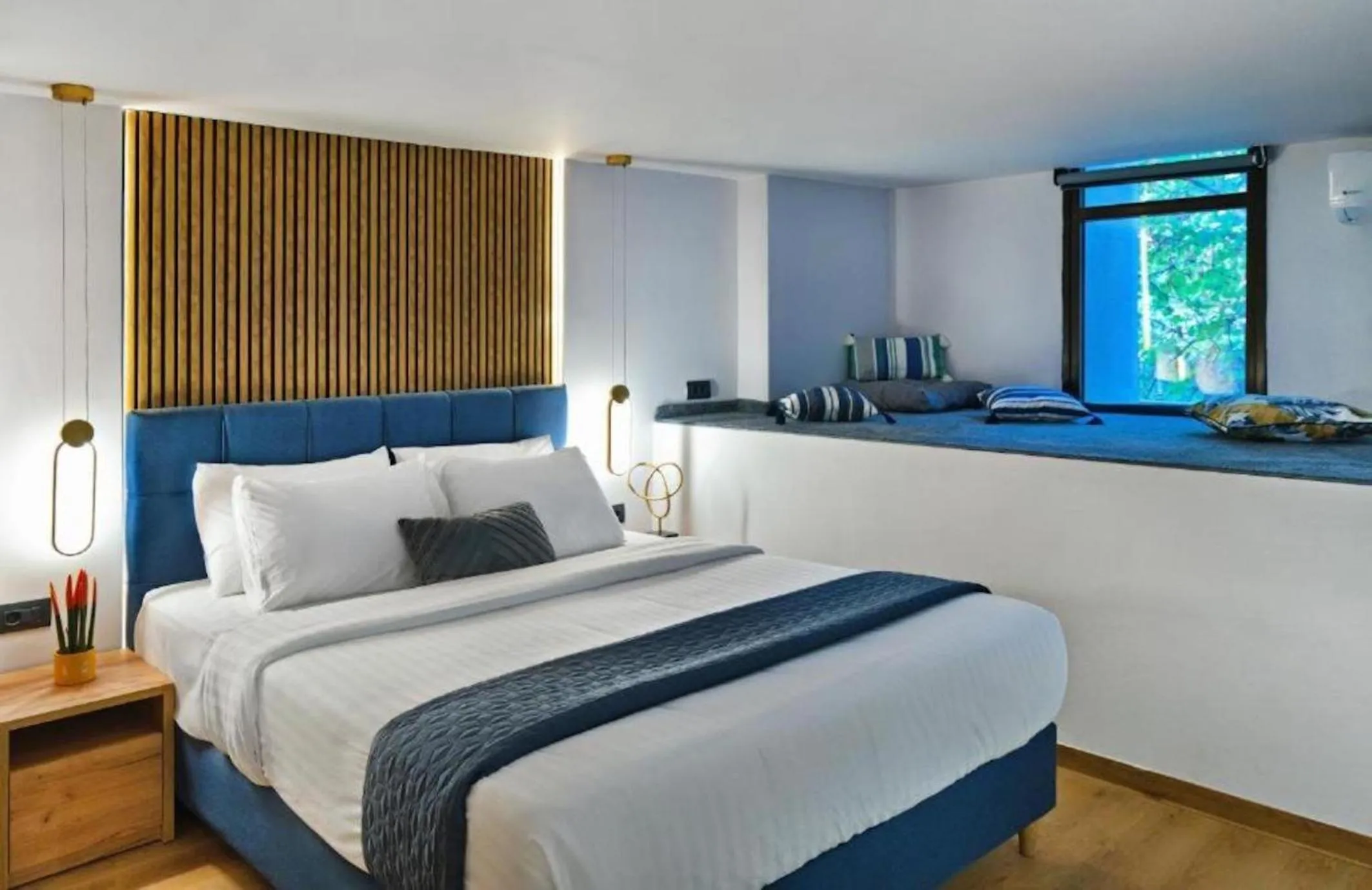 Bed in CITYLUXE Suites & Rooms