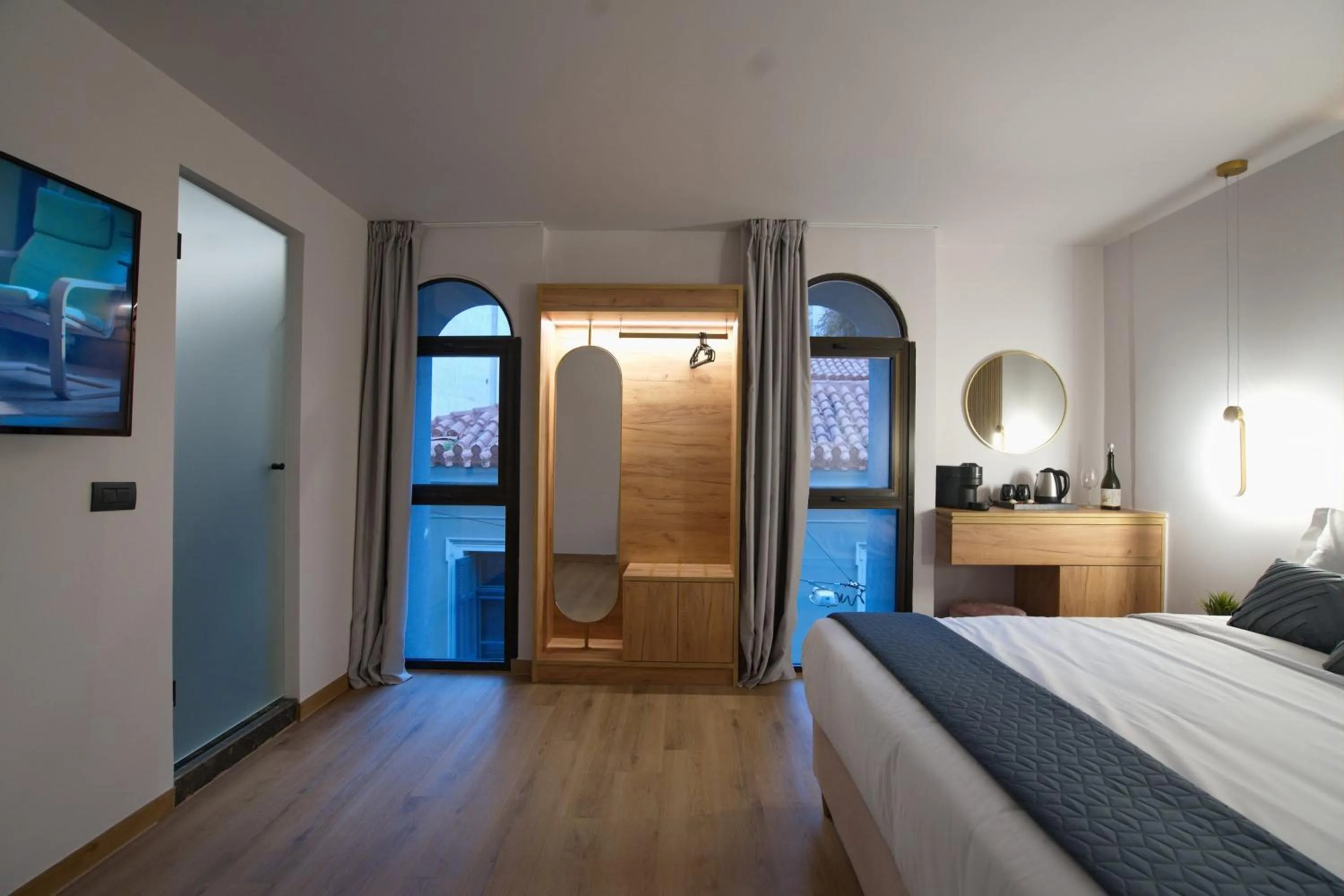 Bed in CITYLUXE Suites & Rooms