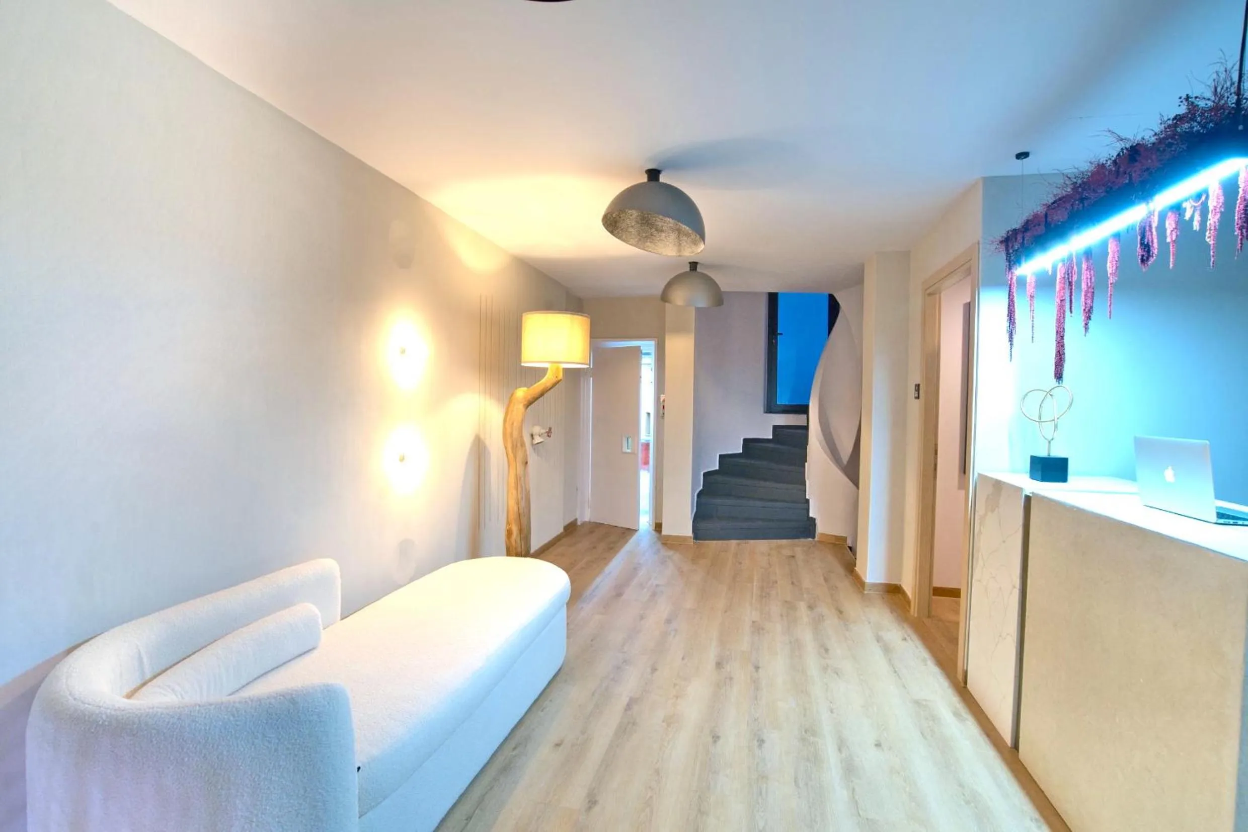 Bed in CITYLUXE Suites & Rooms