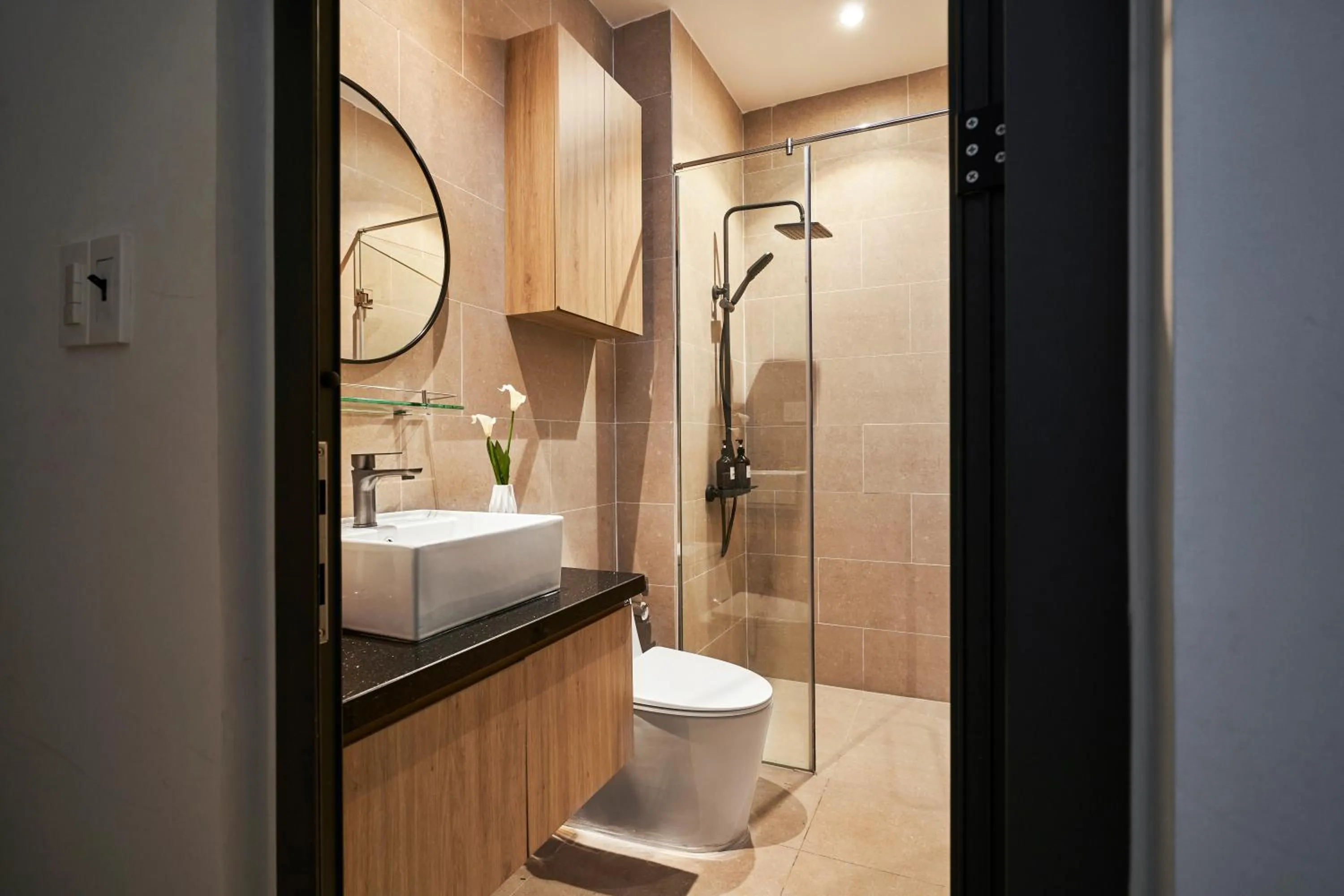 Shower in MIHN SUITES BEN THANH