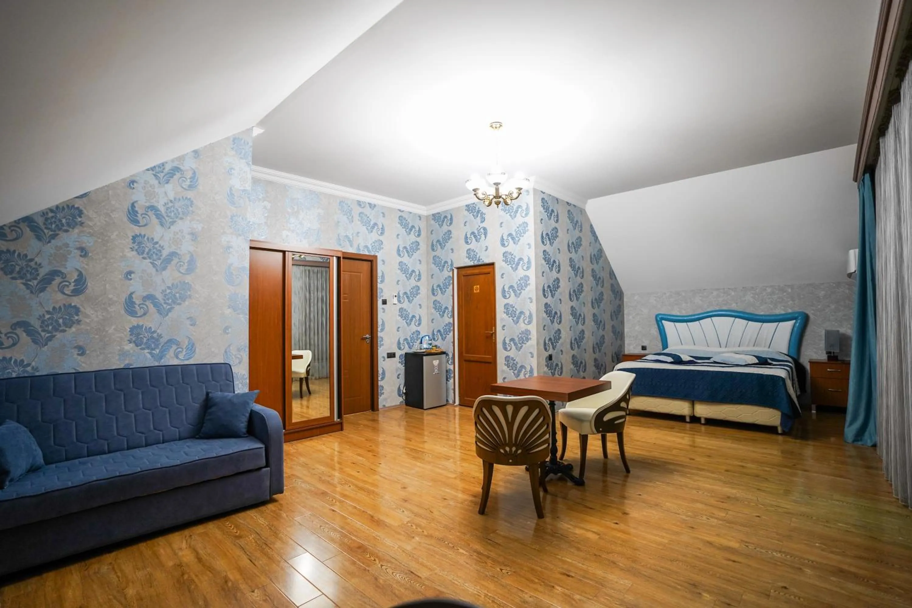 Living room, Bed in Natali Hotel