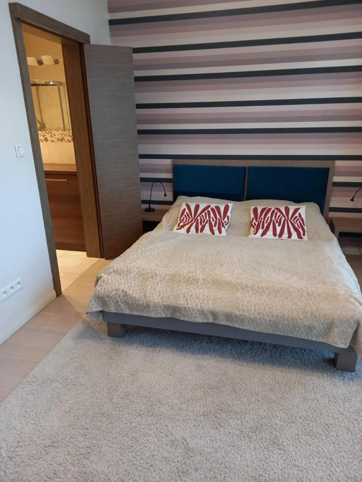 Bed in Apartment with an Amazing View